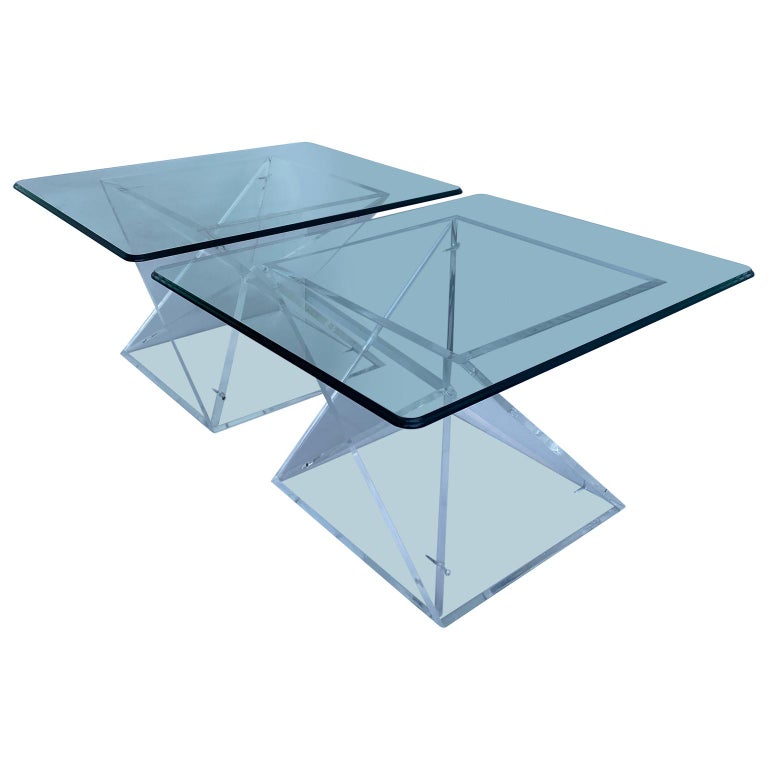 Pair of Mid-Century Modern Lucite side tables with optional bevelled rectangular glass tabletops

Complimentary shipping includes only the Lucite bases, not the glass table tops.