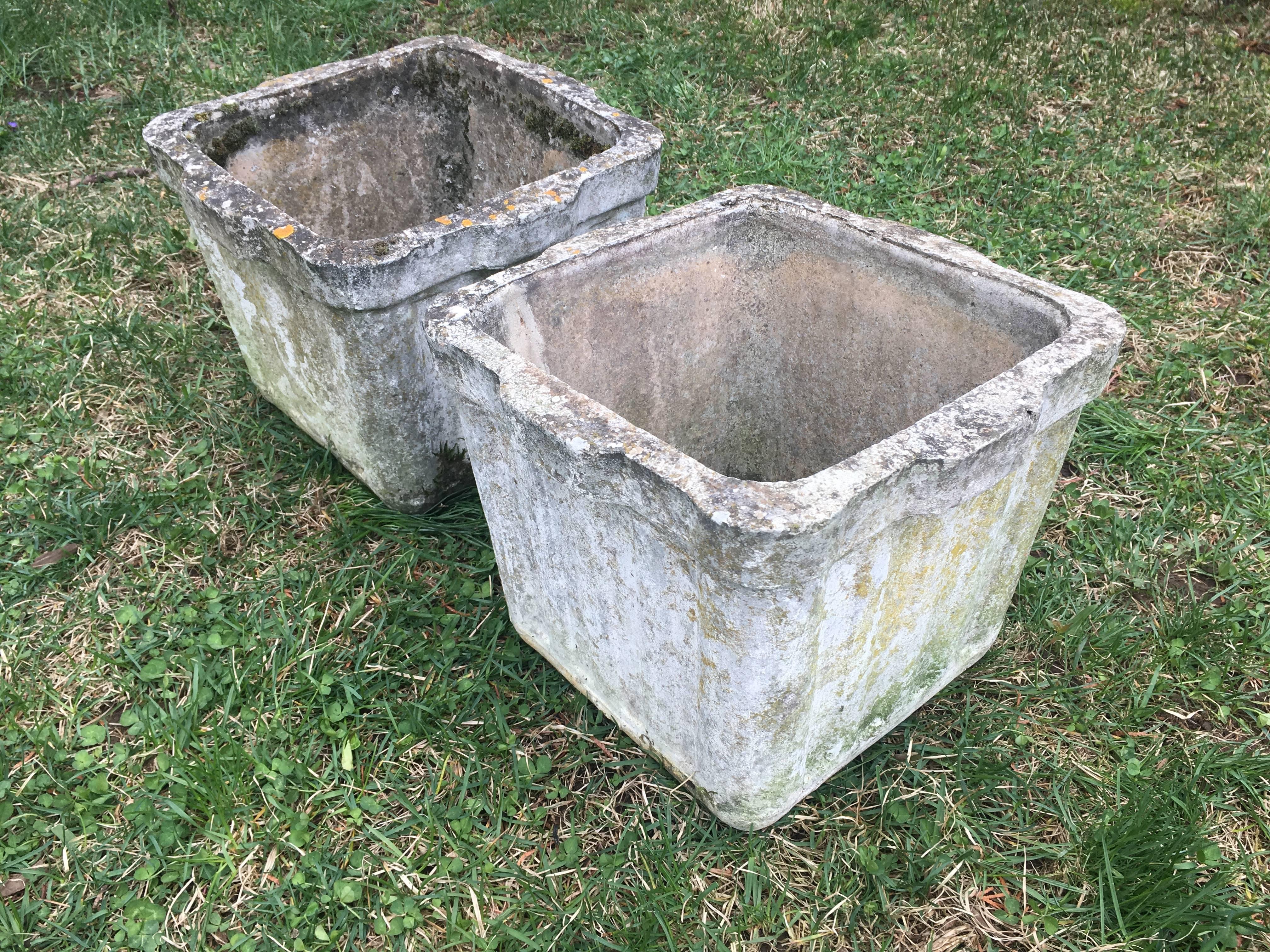 We love the Classic and utilitarian form of these planters, made from fiber cement by the Swiss firm, Eternit, who produced all of Willy Guhl's designs. These planters come in three sizes and this pair is the smallest of the three. With a gorgeous