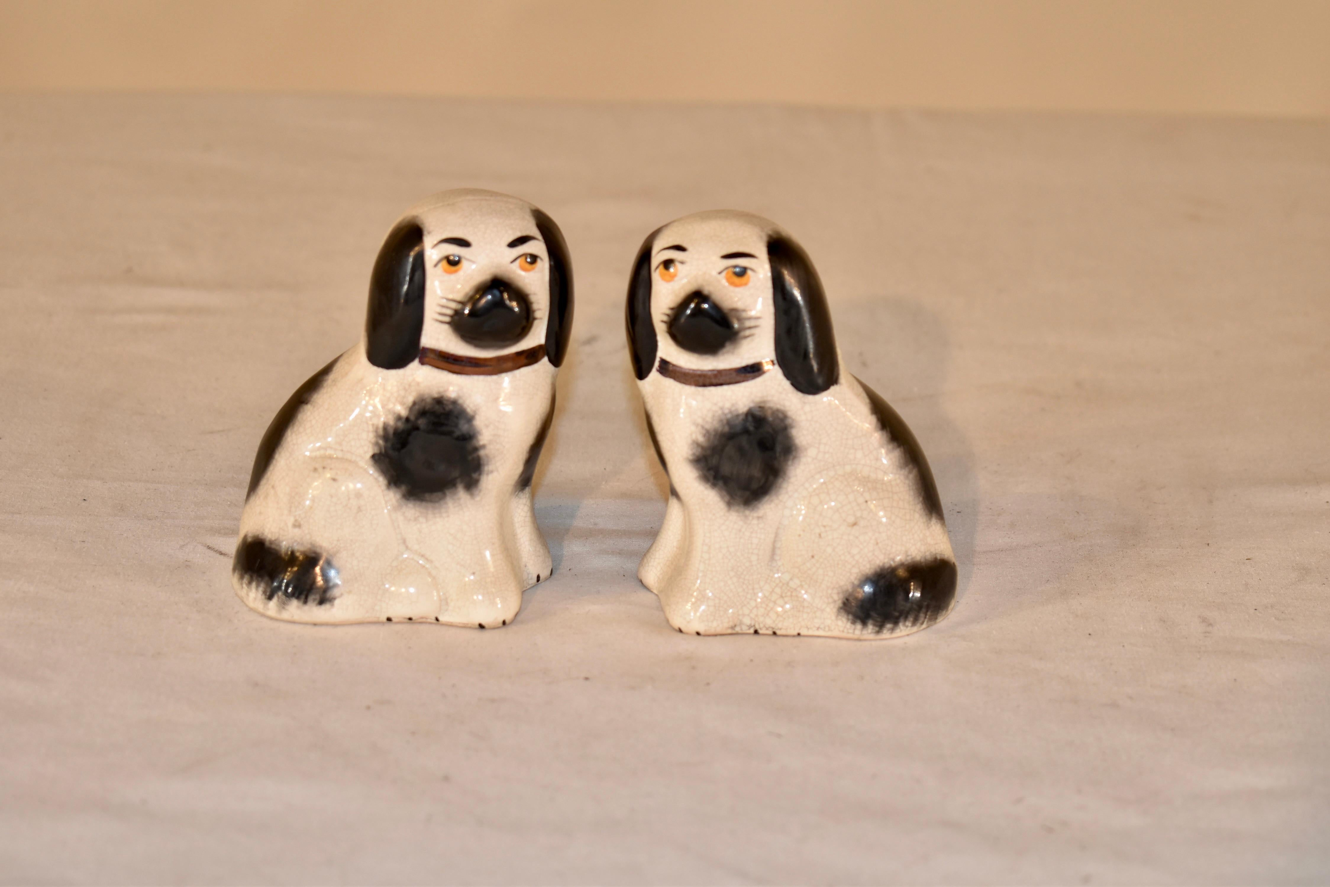 Pair of small black and white Staffordshire dogs from England, circa 1970s.