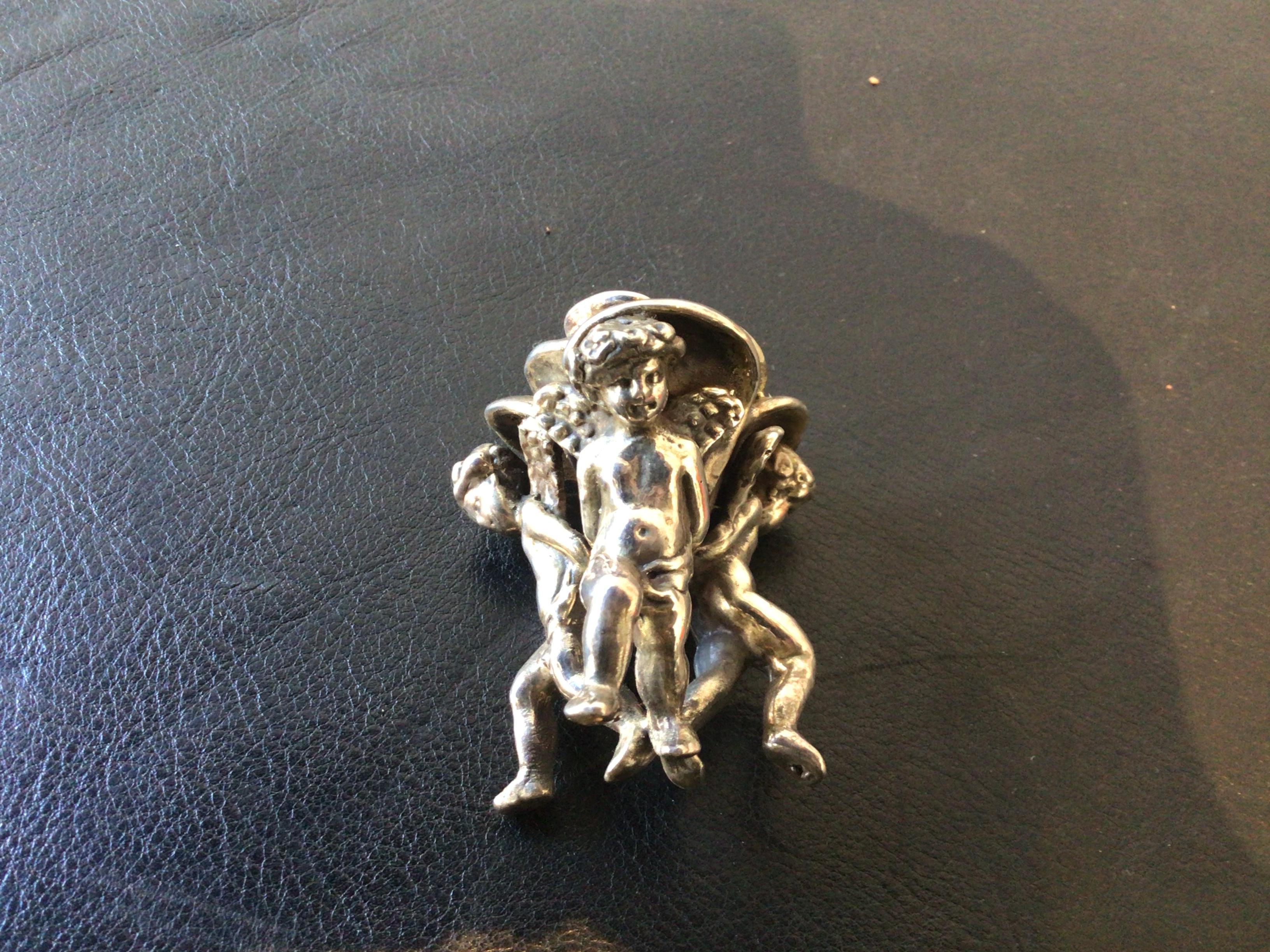 Pair of Small Sterling Silver Cherub Candlesticks For Sale 1