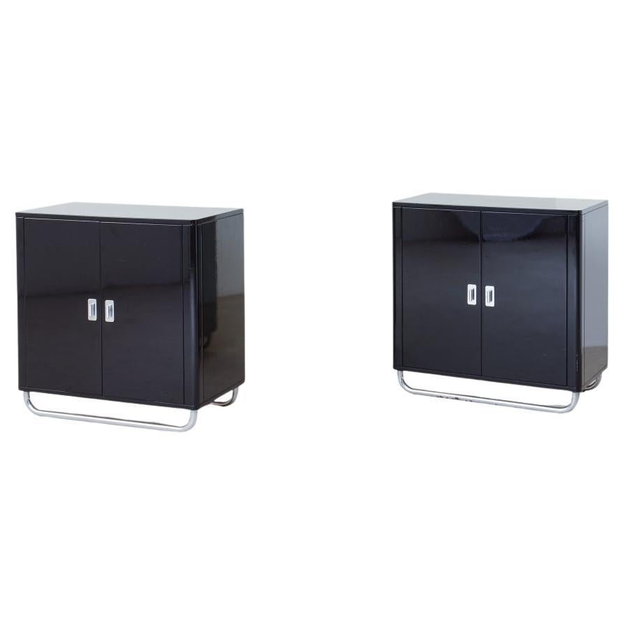 Pair of small storage units in lacquered wood