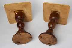 Coppia di tavolini con piano in legno dorato
