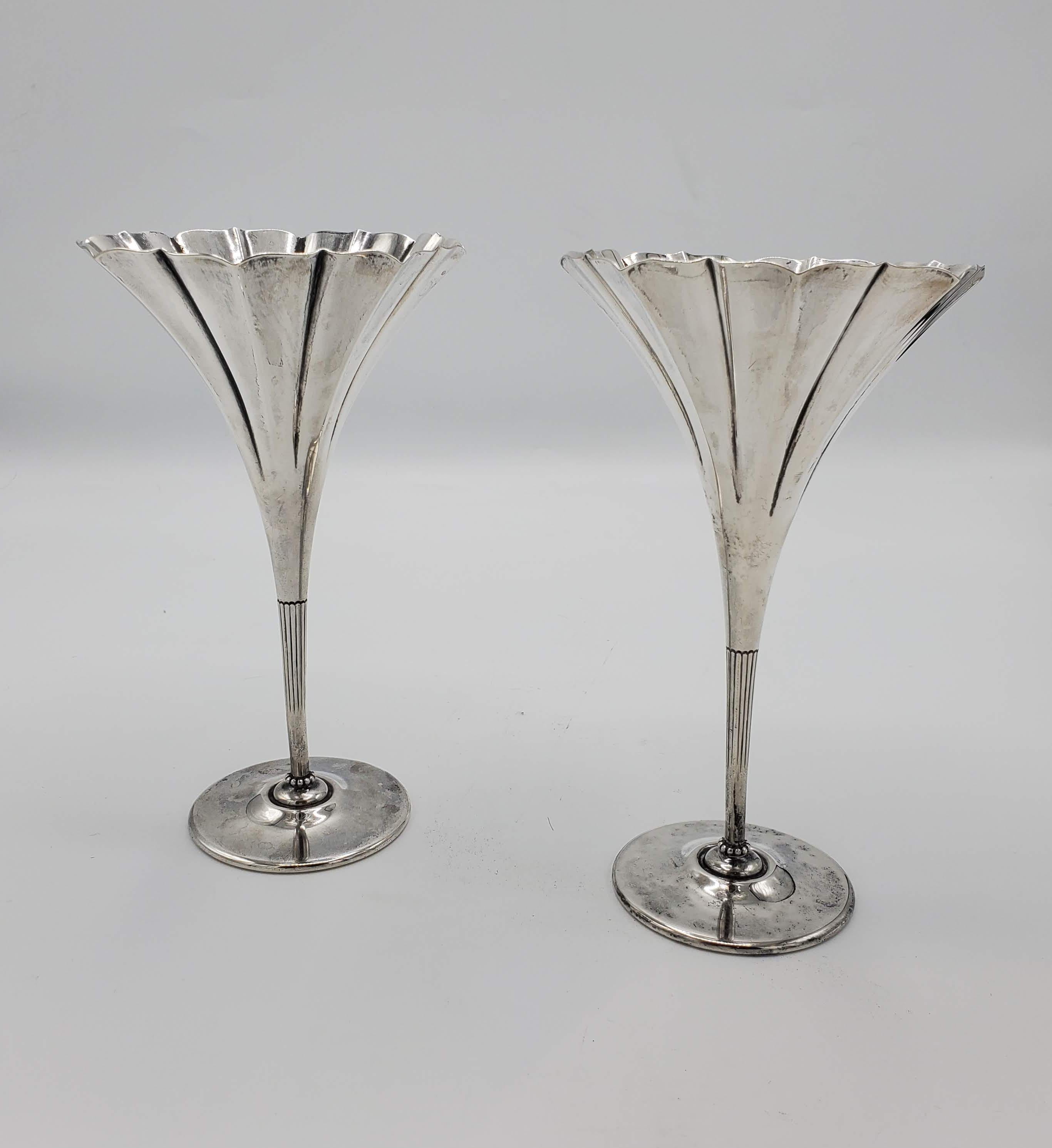 Pair of Small Tiffany & Co. Sterling Silver Art Nouveau Flower Shaped Vases
Two beautiful fluted vases that are in excellent condition. 
Stamped on bottom: 