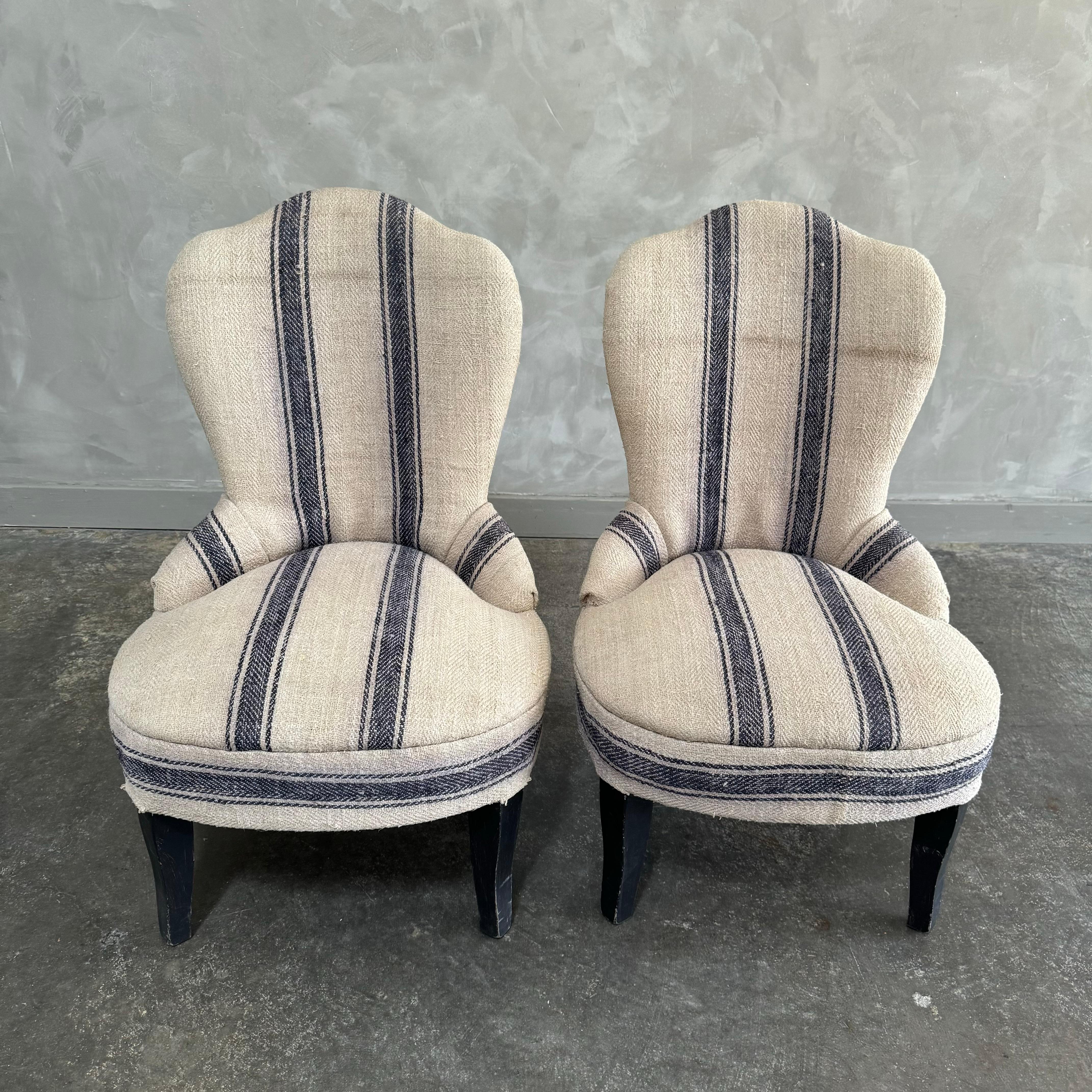 Pair of vintage petite chairs, great for a kids room. Nailhead trim and thick vintage stripe linen make these simple chairs a great choice to add a vintage charm to any room.
Dimensions: 19