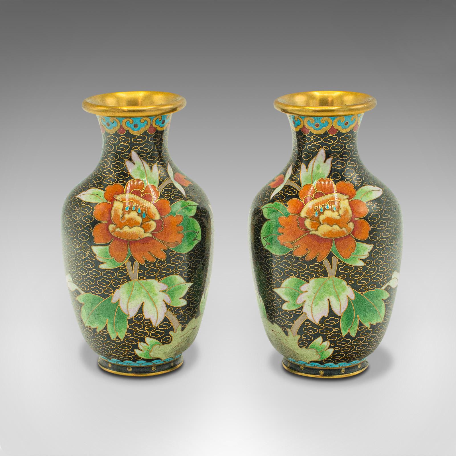 This is a pair of small vintage cloisonné posy vases. A Japanese, ceramic flower urn, dating to the late Art Deco period, circa 1950.

Delightfully diminutive, with an attractive finish.
Displays a desirable aged patina and in good order.
Black