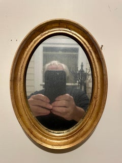 Pair Of Small Vintage Gilt Oval Italian Mirrors