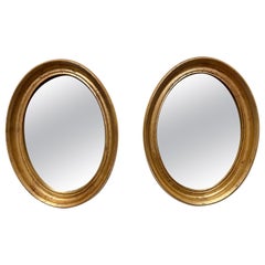 Pair Of Small Vintage Gilt Oval Italian Mirrors
