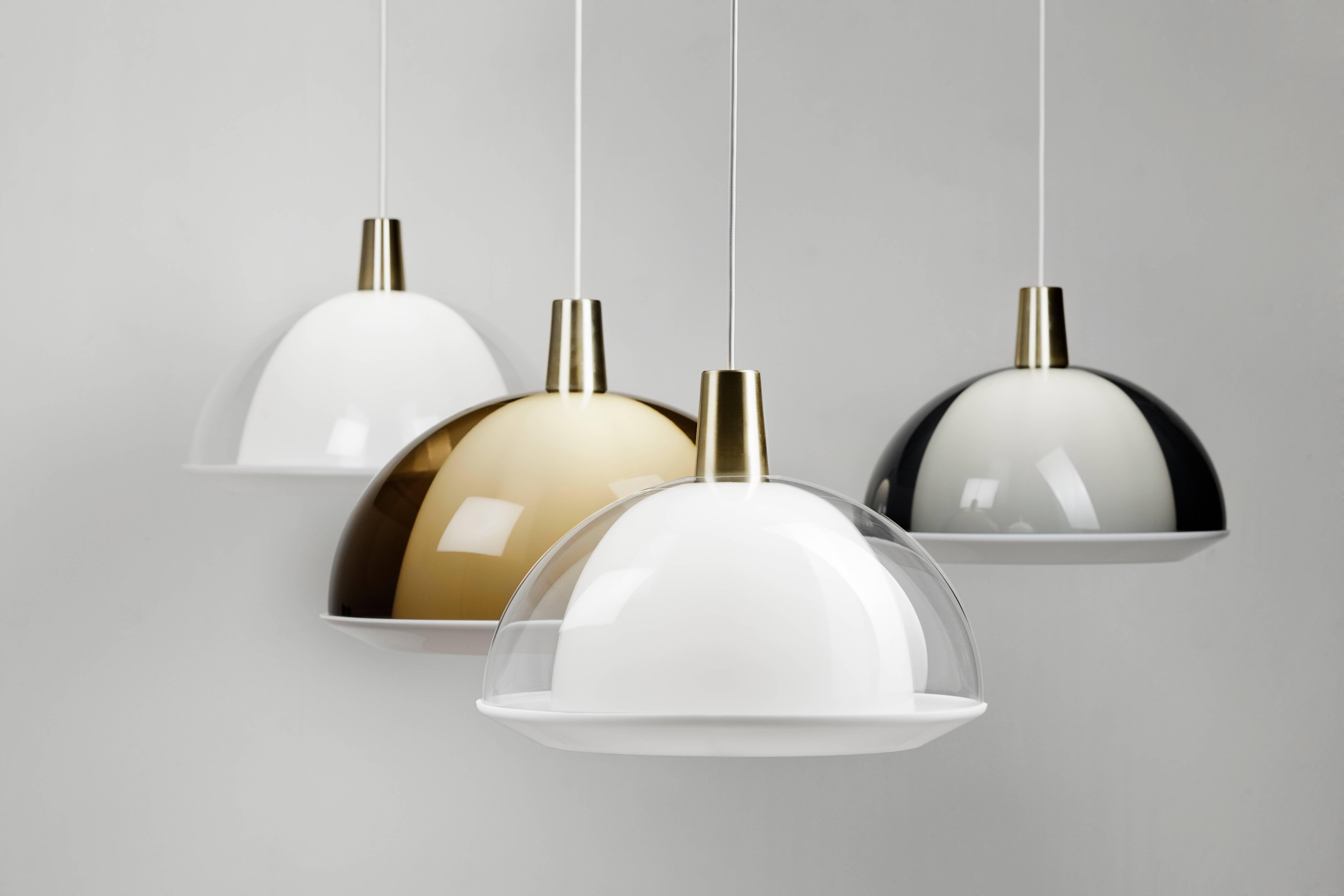 Pair of Small Yki Nummi 'Kuplat' Pendants in Smoke Gray. Designed in 1959, Nummi's iconic light consists of two acrylic shades of different colors, one nesting inside the other. The name Kuplat means bubbles in Finnish. As Nummi once astutely