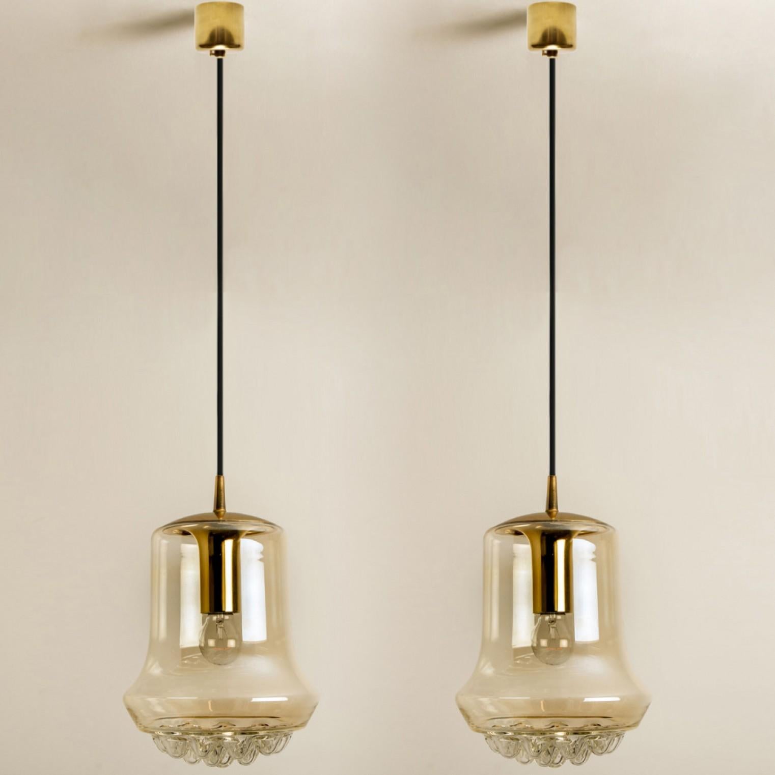 Mid-Century Modern Pair of Smoked Brown Glass and Brass Pendant Lights by Peill and Putzler, 1960s For Sale