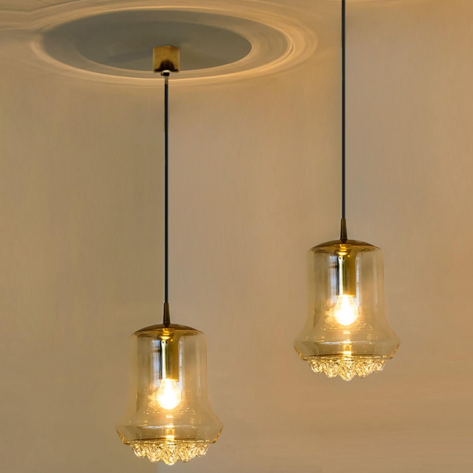Pair of Smoked Brown Glass and Brass Pendant Lights by Peill and Putzler, 1960s In Good Condition For Sale In Rijssen, NL