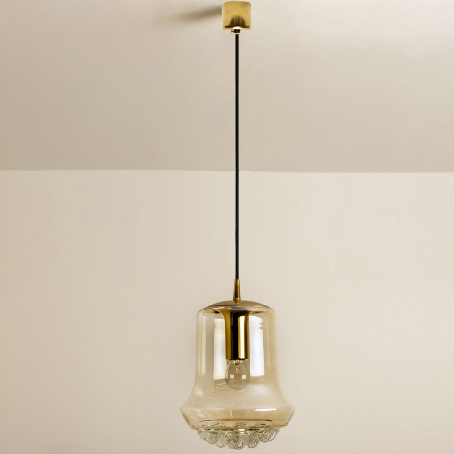 Mid-20th Century Pair of Smoked Brown Glass and Brass Pendant Lights by Peill and Putzler, 1960s For Sale