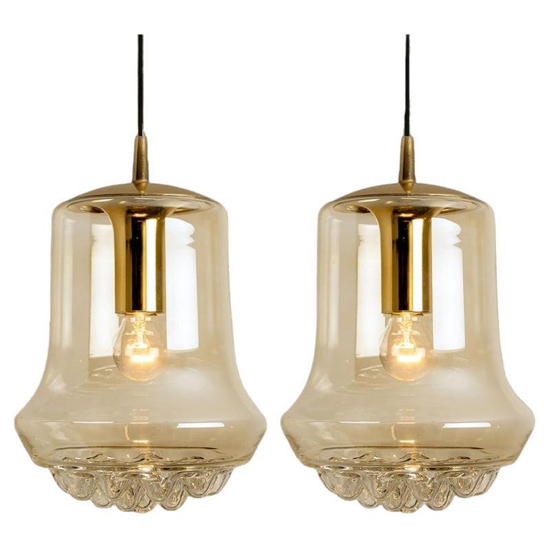 Paire de lampes suspendues en verre brun fumé et laiton par Peill & Putzler, années 1960
