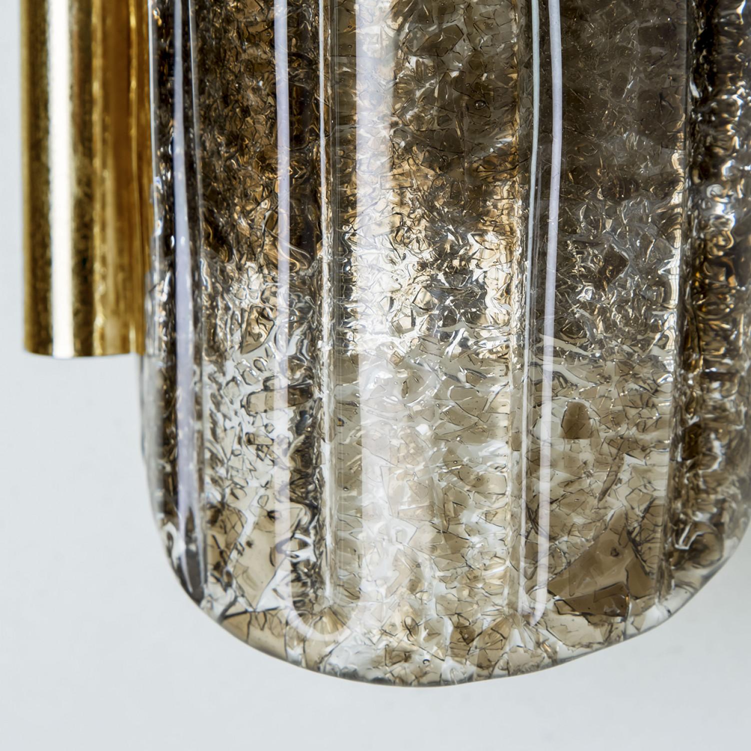 Pair of beautiful Smoked Glass Wall Lights by Kaiser Leuchten, 1970s. The smoked glass gives a wonderful glow. The glass is mounted on a brass colored metal back plate.

Please notice the price is for the pair.

Dimensions:
Height: 11.42