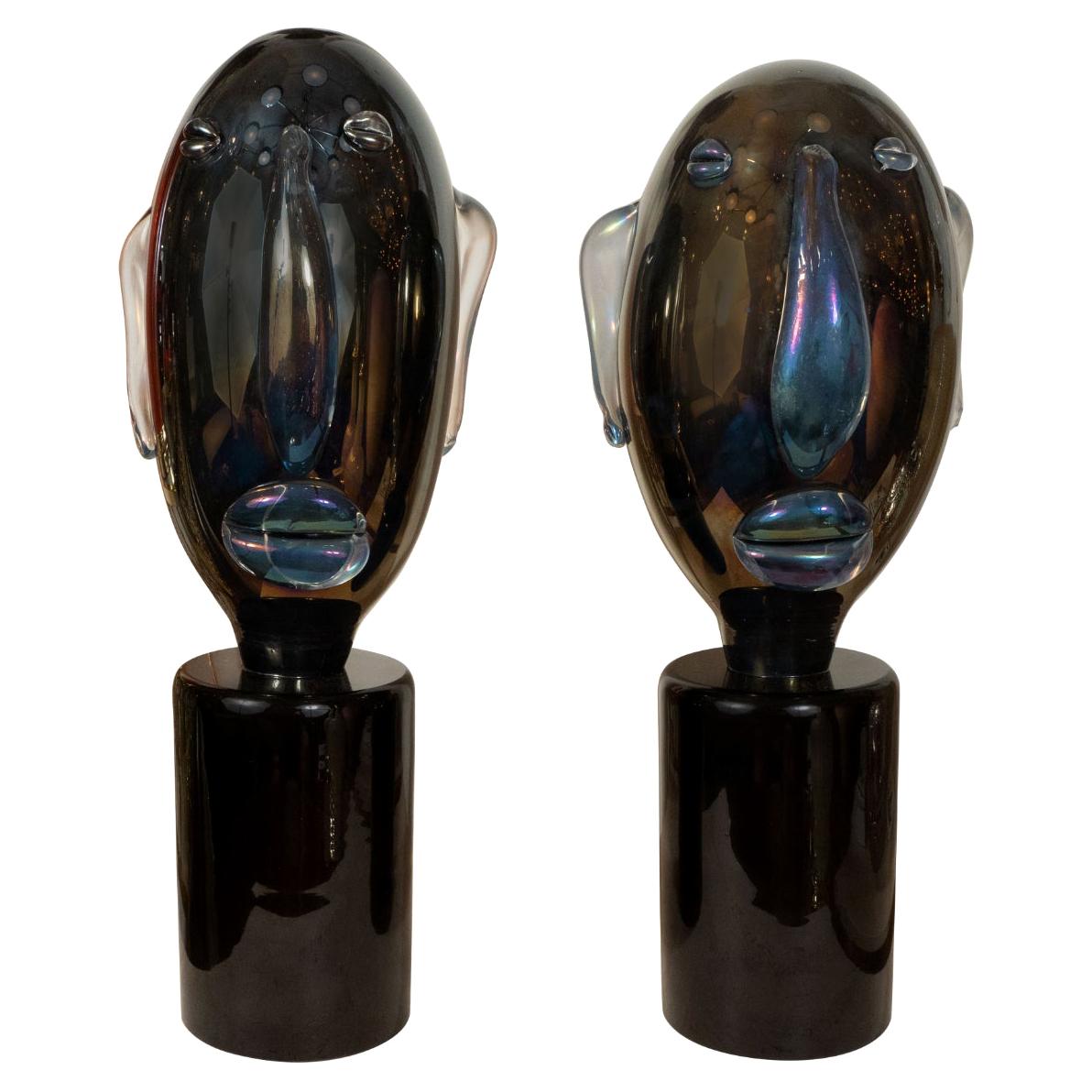 Pair of Smoky Glass Head Sculptures