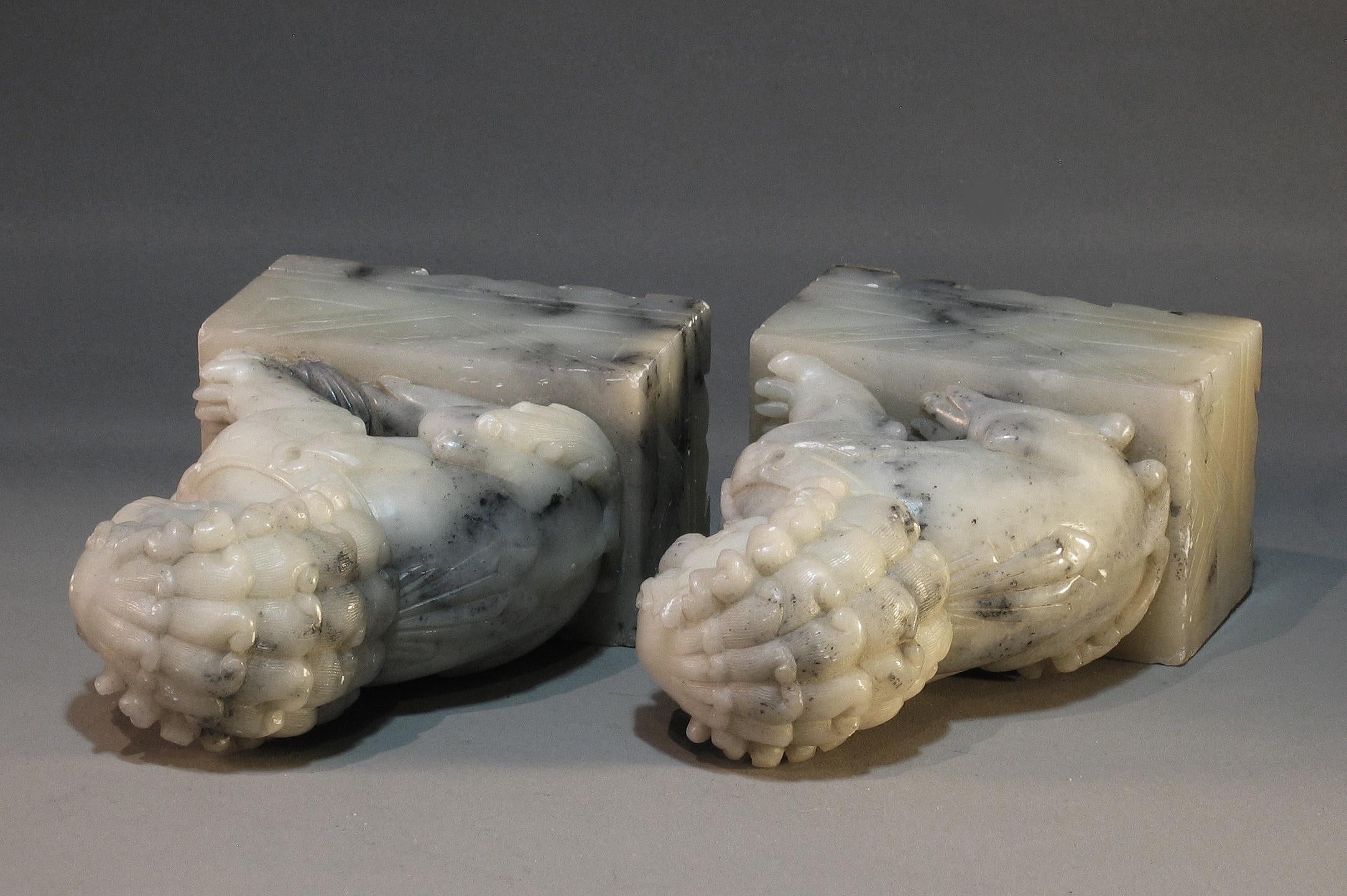 Carved Pair of Soapstone Buddhist Lions For Sale