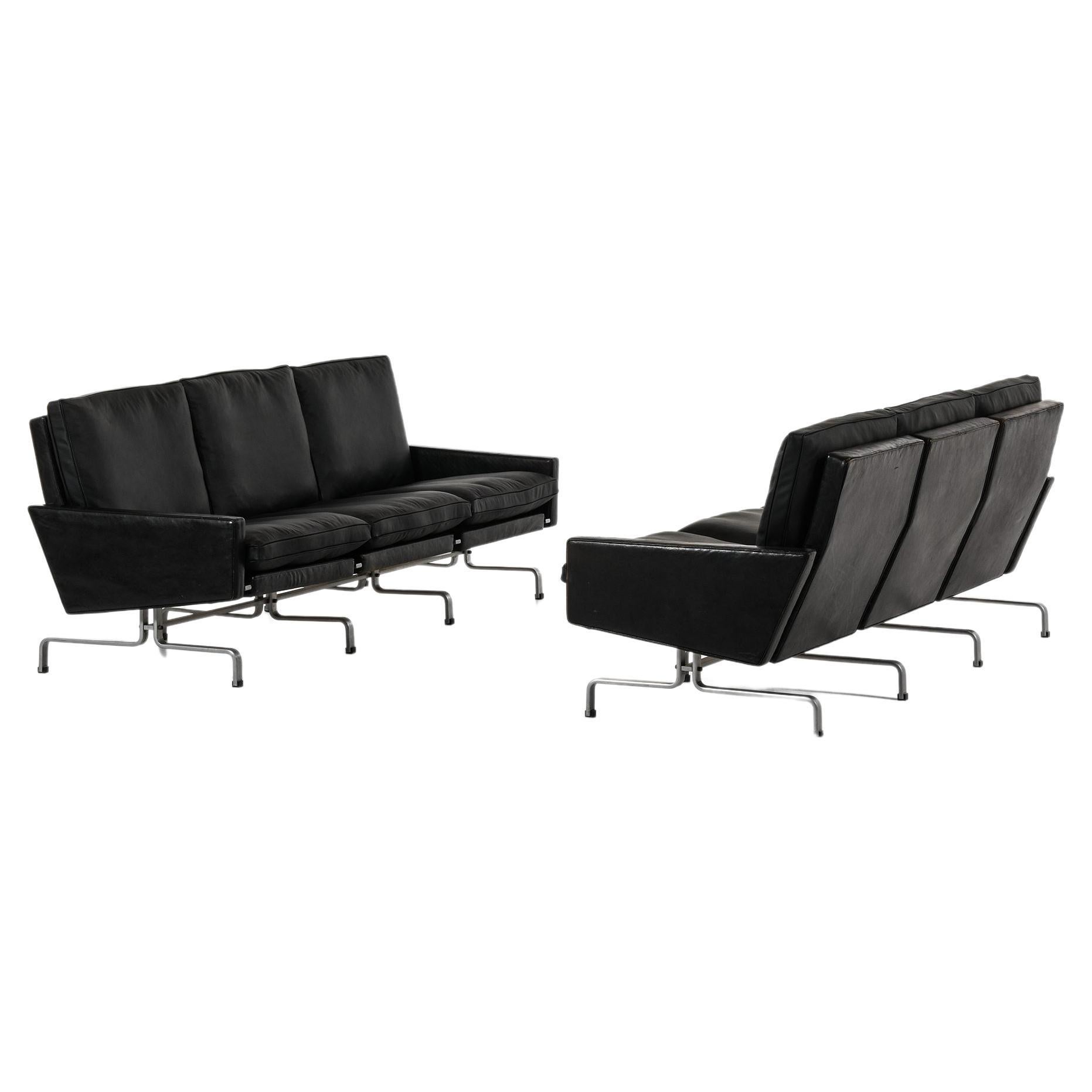 Pair of Sofas in Black Leather and Flat Steel by Poul Kjærholm, 1958 For Sale