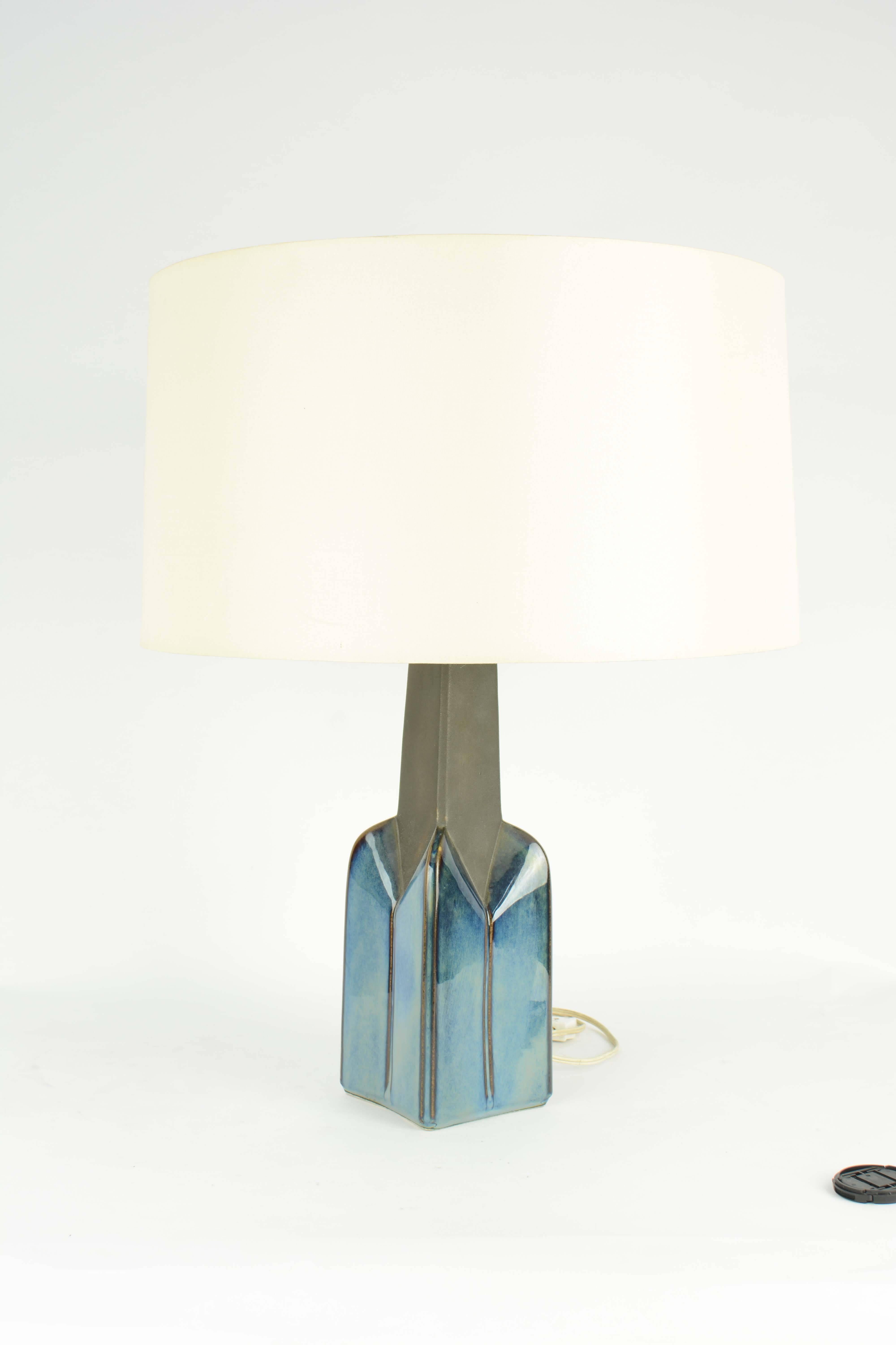These beauties are hand glazed from Soholm factory in 1960s. They are both impressive and elegant in their presence and form. The lamps are sold without shades and can to rewired for an addition cost. Please look at the all the photos because the