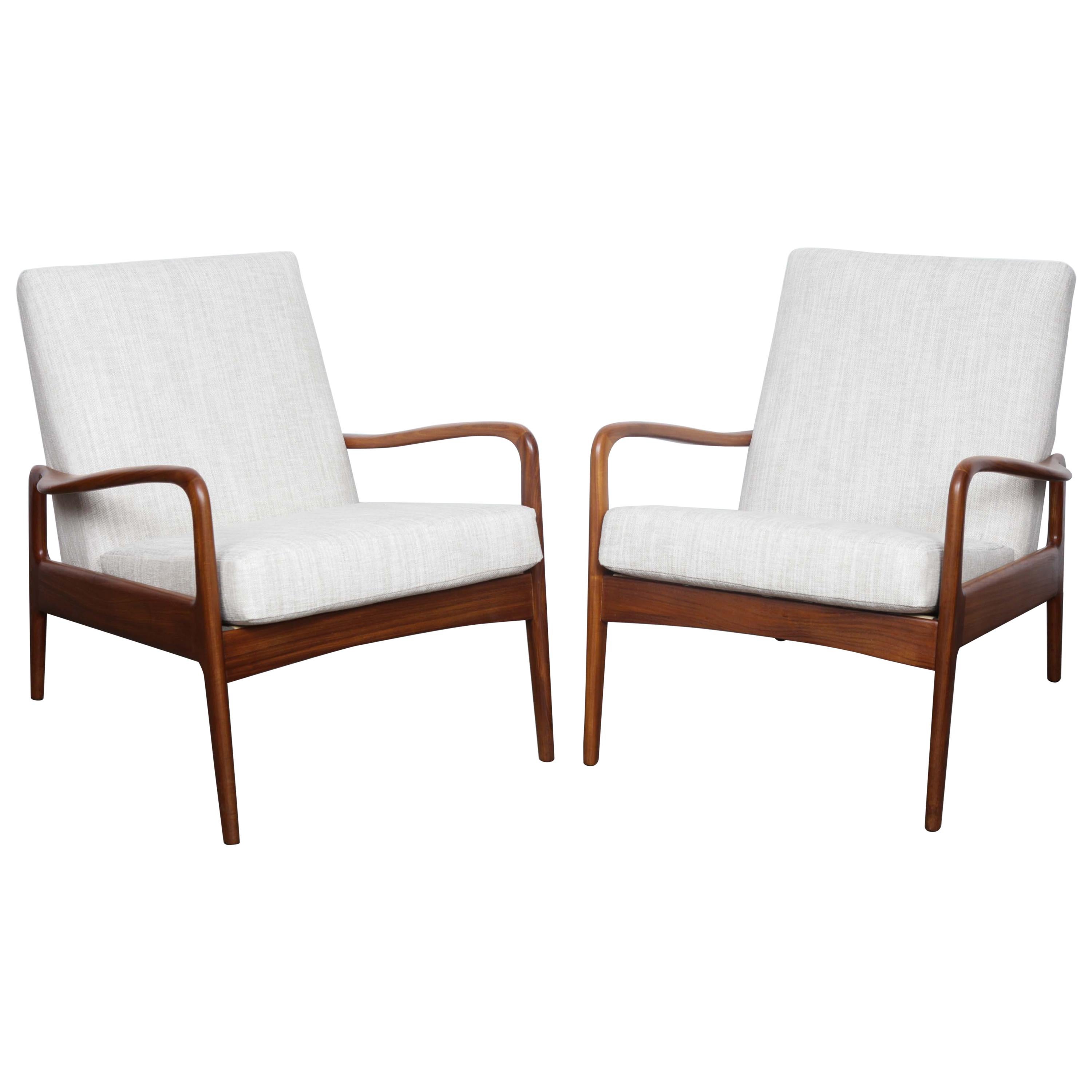 Pair of Solid Afromoisa Teak Lounge Chairs by Greaves and Thomas, England
