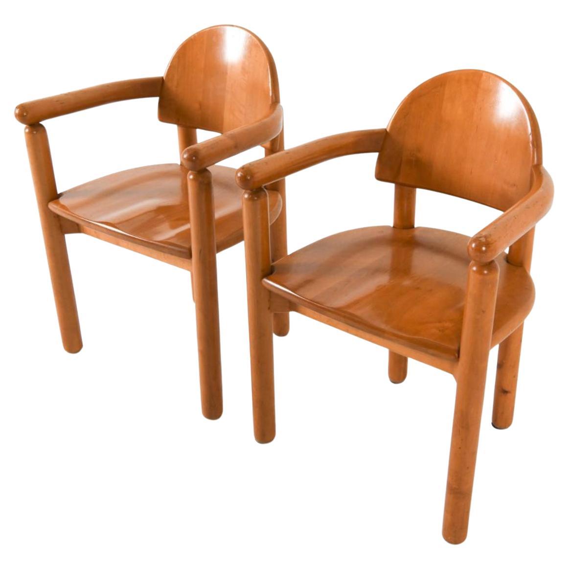 Pair of solid Beech sculptural arm chairs by Rainer Daumiller