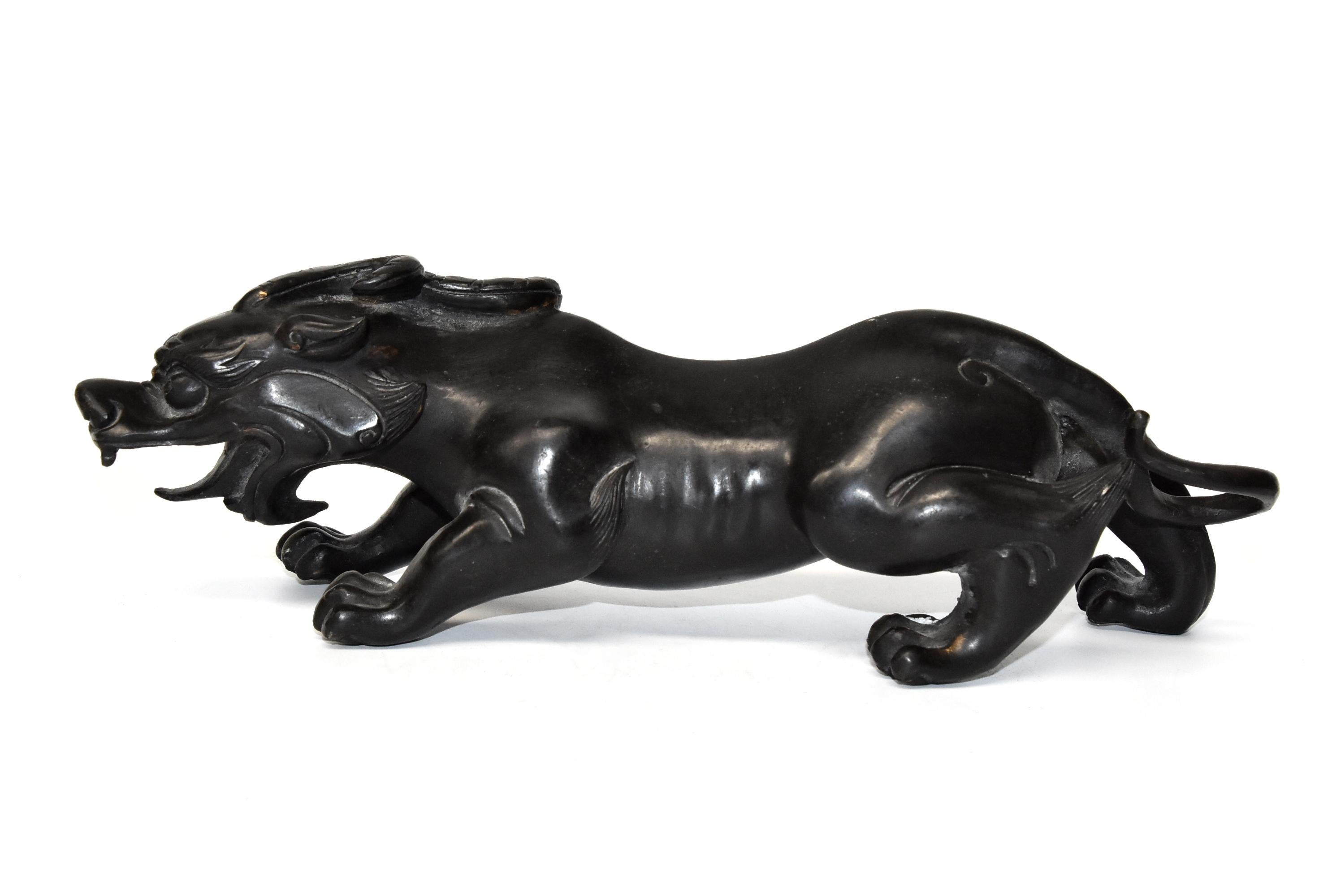 20th Century Pair of Solid Black Bronze Pi Xiu Lions Paperweights