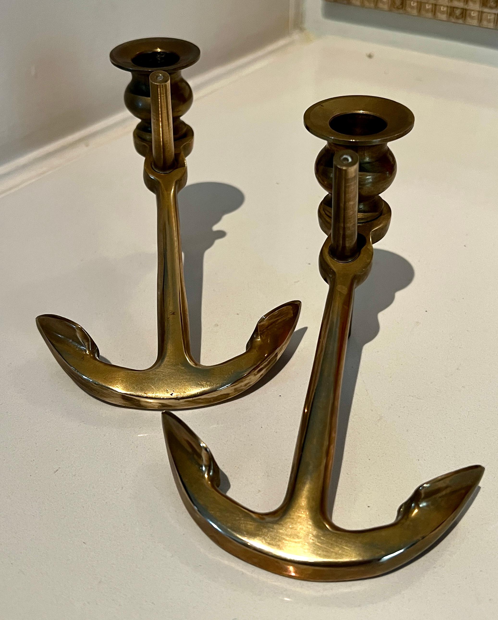 Pair of anchor candlesticks. The pair are a nice addition to a dining table, console or flanking a mantle.

The Anchor motif is ideal with spaces around or near the water.  Solid and elegant.

Please note that the platform’s price guidance tool may