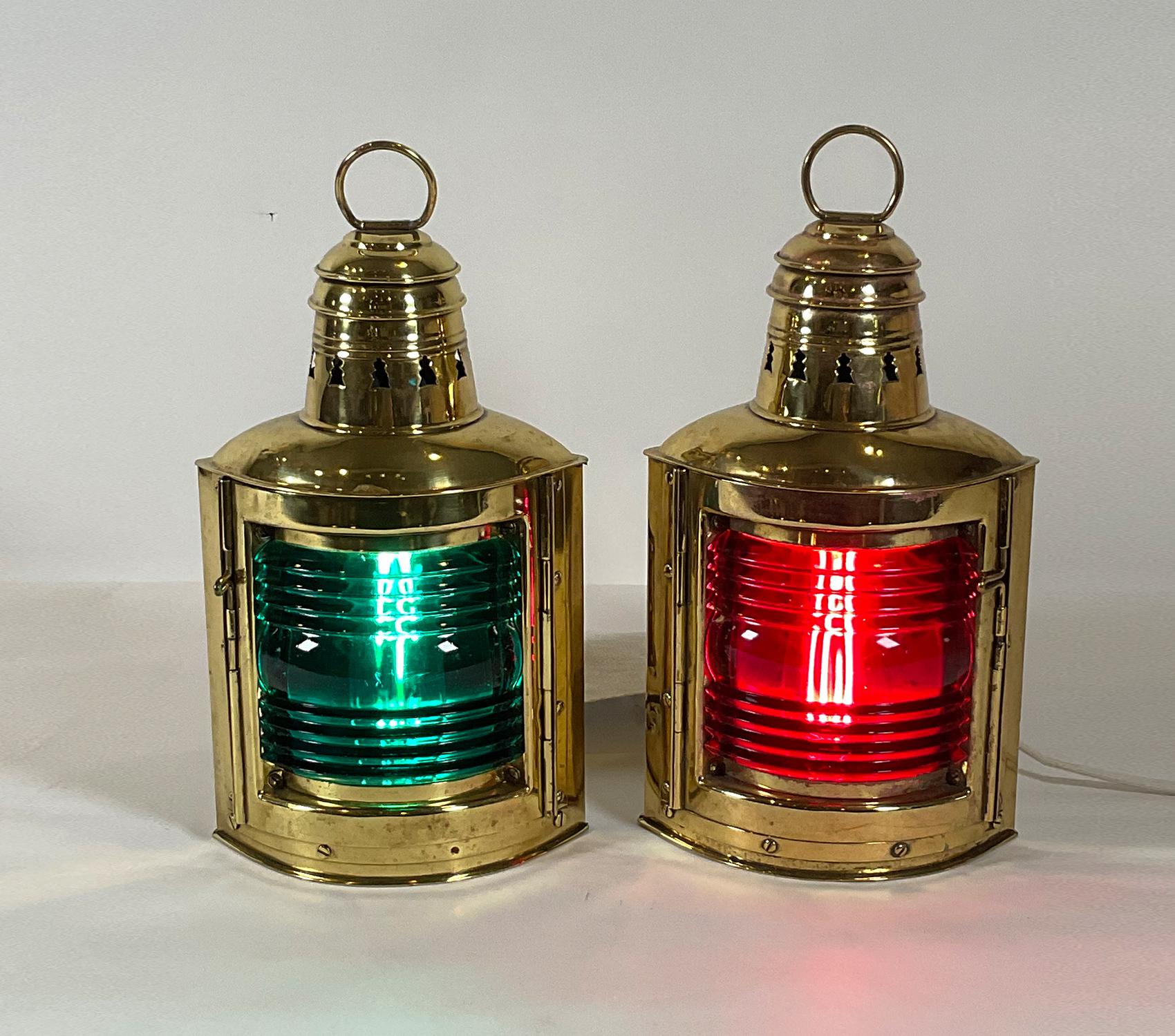 Port and starboard ship’s lanterns by Perkins Marine Hardware Corporation of Brooklyn, New York. Polished and lacquered. Hinged doors hold the richly colored red and blue Fresnel glass lenses. Both are wired for home use.

Weight: 7 LBS
Overall