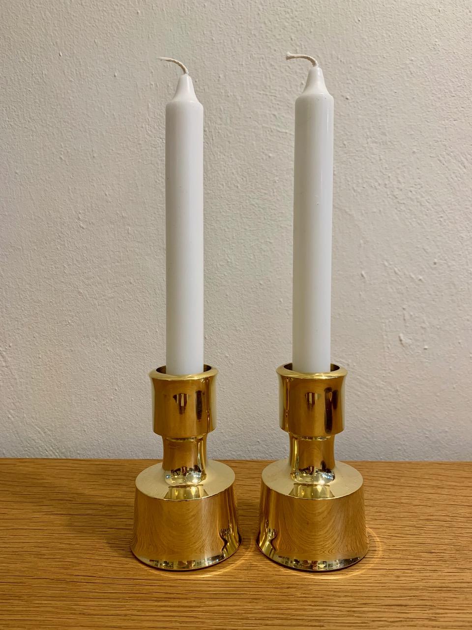 Beautiful set of timeless vintage solid brass candlesticks by Danish designer, sculptor Jens Harald Quistgaard (1919-2008) for Dansk Design, 1963. 
Very nice heavy quality. 
Candle holders come in very good, freshly polished condition. 

Marked on