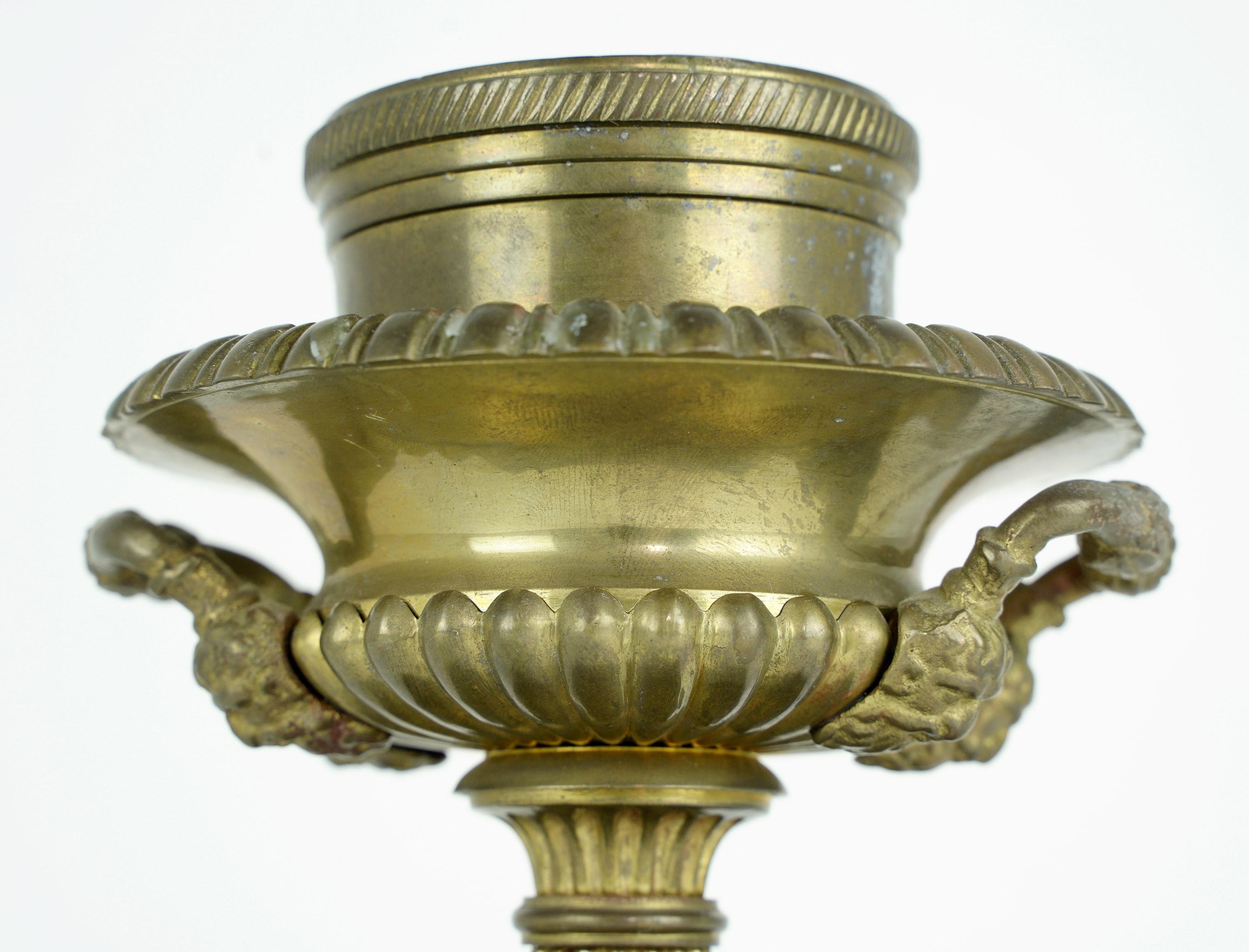 Solid brass candle holders with ornate details. Made by Mottahedeh. Marked Historic Charleston Reproductions underneath the bottom. Original patina. Sold as a pair. Please note, this item is located in our Scranton, PA location.