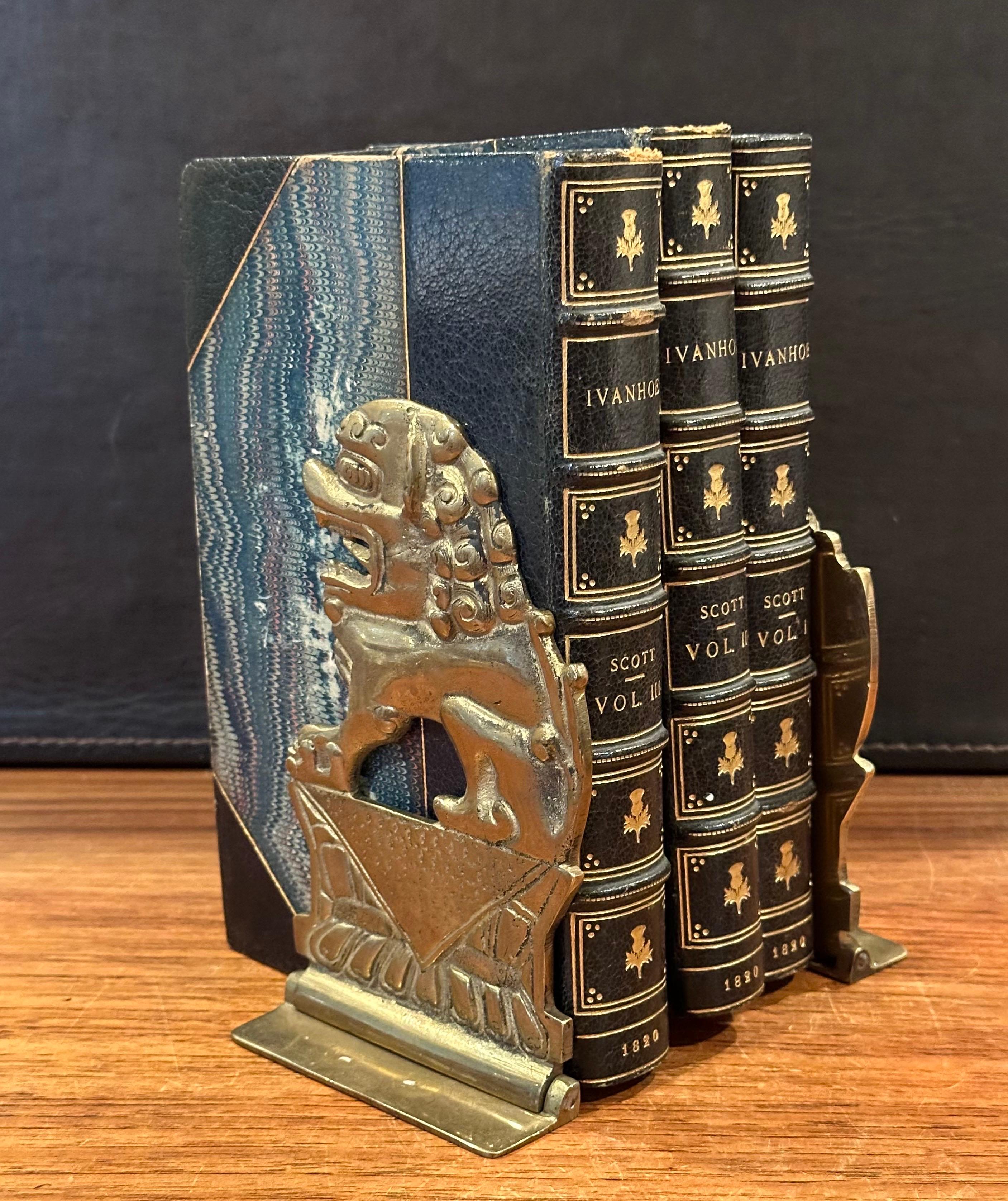 Pair of Solid Brass Folding Chinese Foo Dog Bookends In Good Condition For Sale In San Diego, CA