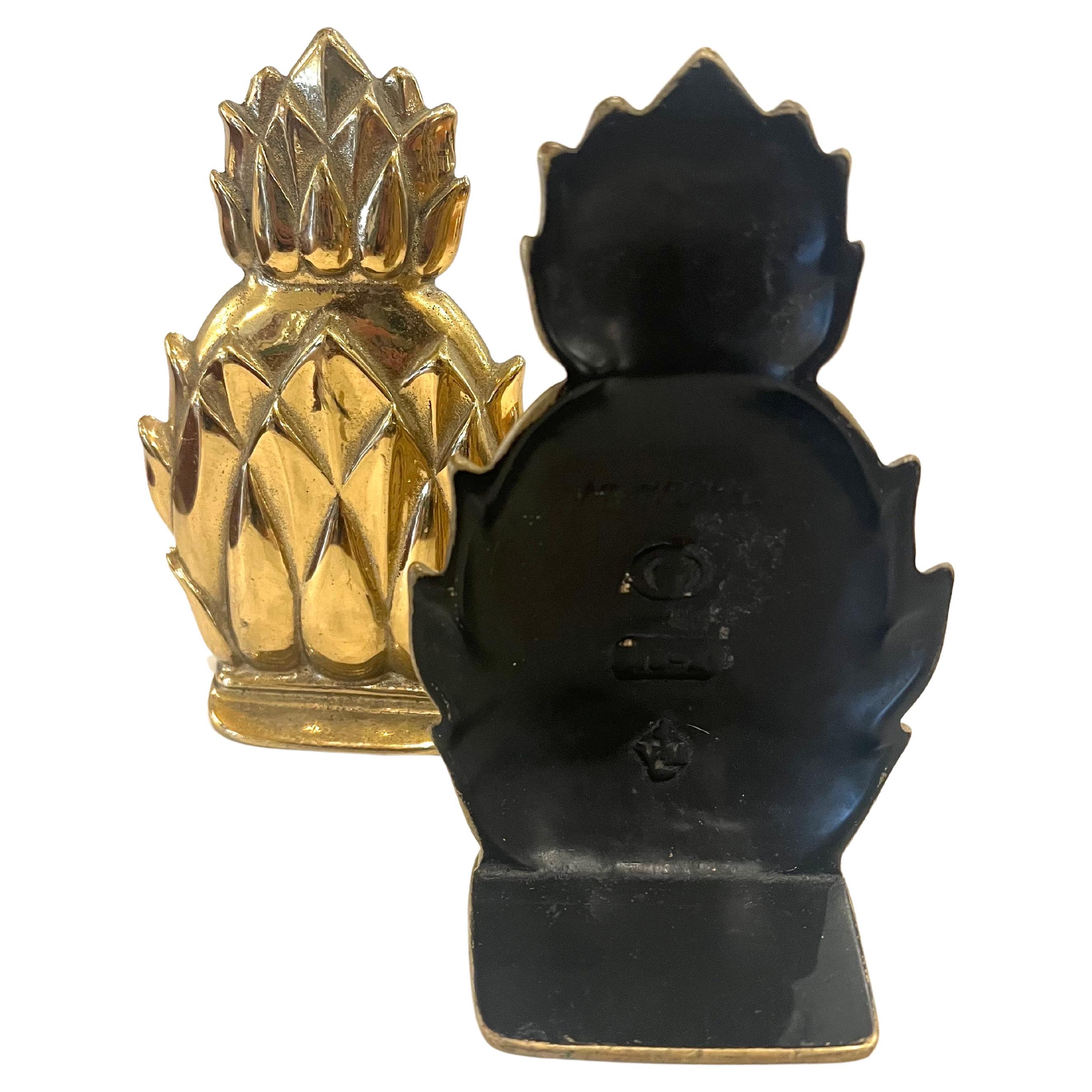 A very good looking pair of solid polished brass pineapple bookends, by Virginia Metalcrafters circa 1970s.