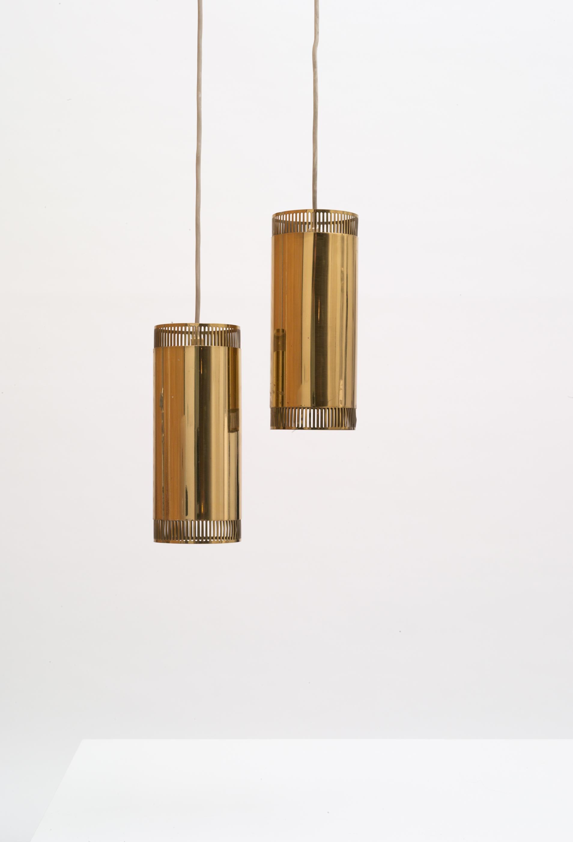 Pair of pendant lights produced by Boréns (1924-1985), Borås, Sweden, 1950s. Made out of solid brass.