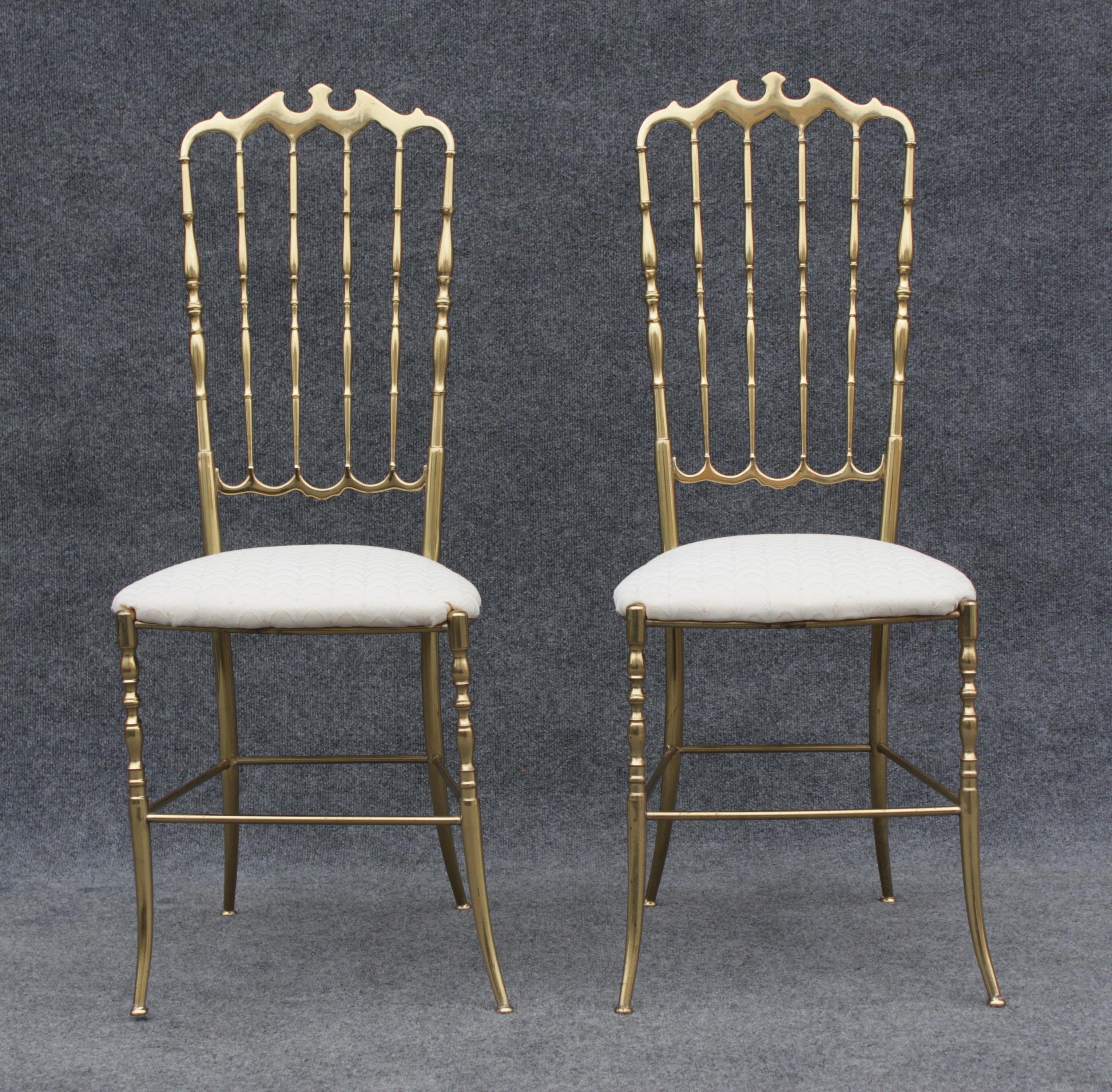 Designed in the early 1900s, these chairs were produced in the 1960s by Chiavari. Made in Italy, they feature excellent construction. With solid brass frames, they feature intricate details all over the back and legs. The back is a series of posts