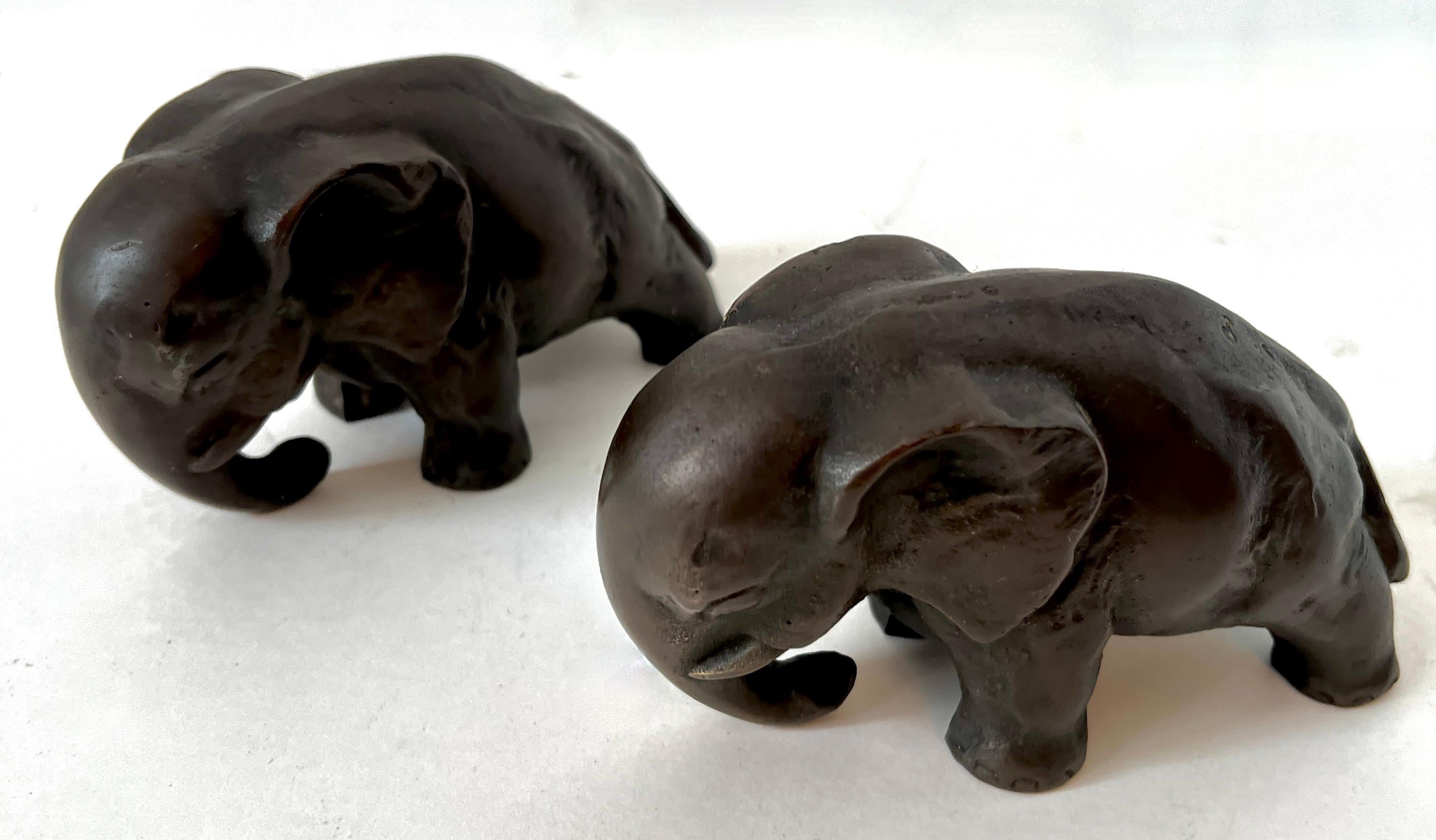 Patinated Pair of Solid Bronze Elephant Bookends For Sale