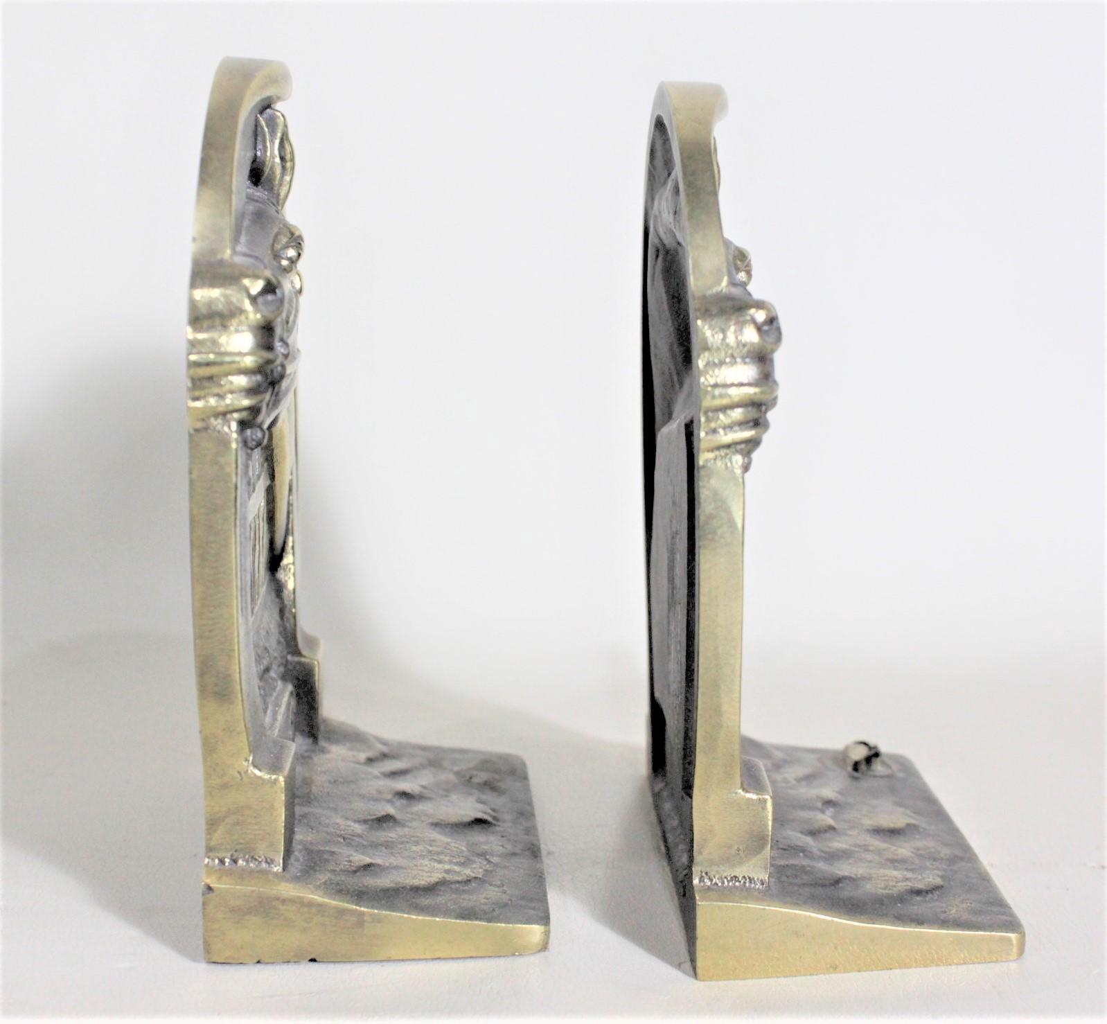 Mid-Century Modern Pair of Solid Cast Brass Mid Century Era Horse Related Bookends For Sale