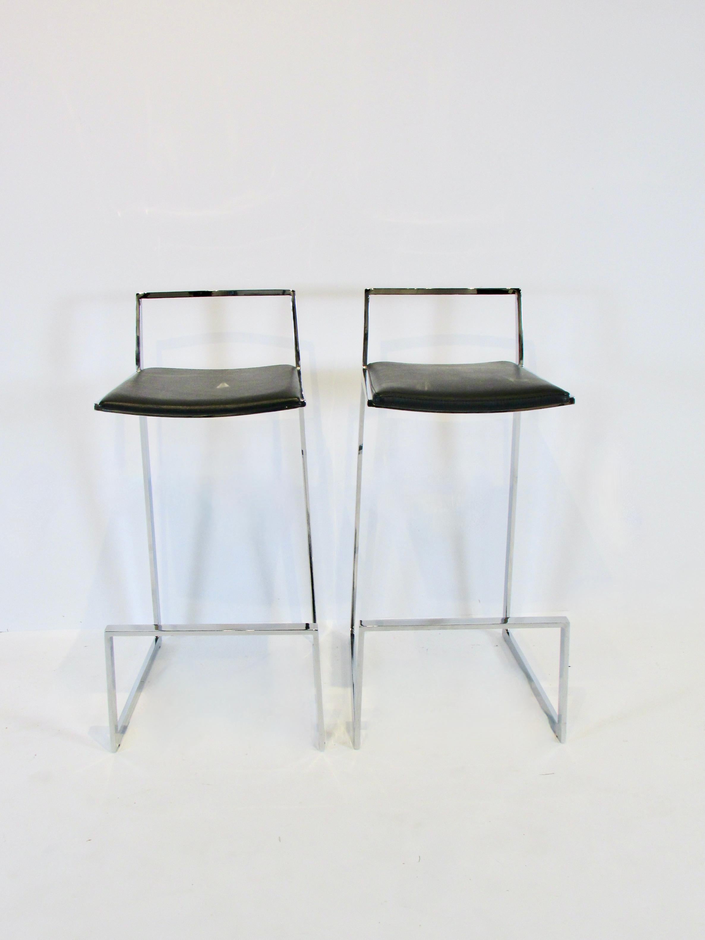 Polished Pair of Solid Chrome Cantilever Frame Bar or Counter Stools with Black Leather