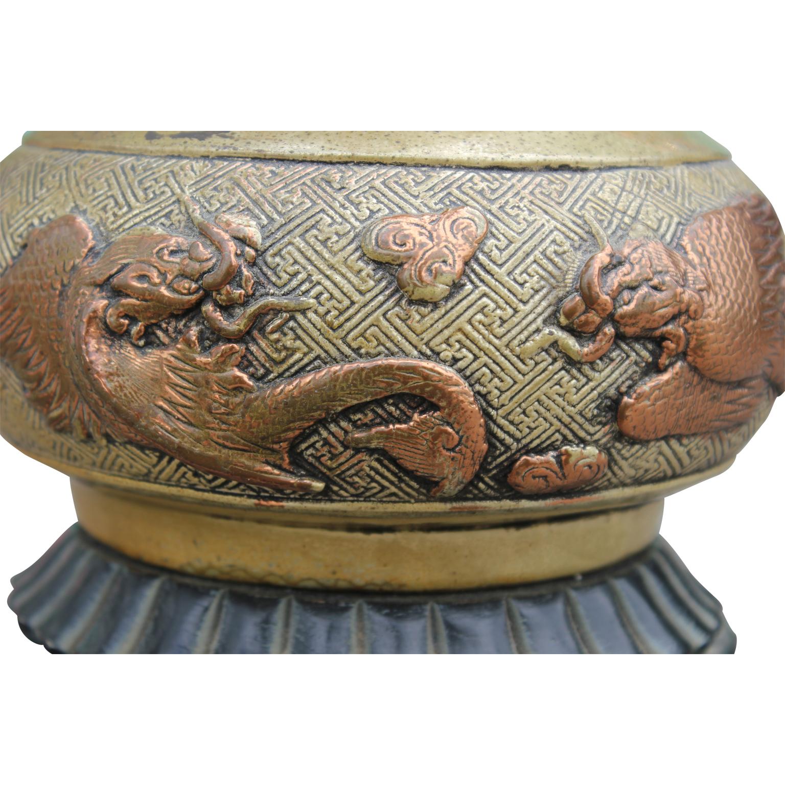 Hollywood Regency Pair of Solid Copper Asian Style Lamps with Dragon Motifs and Silver Wash