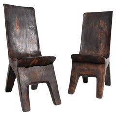Pair of solid exotic wood chairs, 1950s.