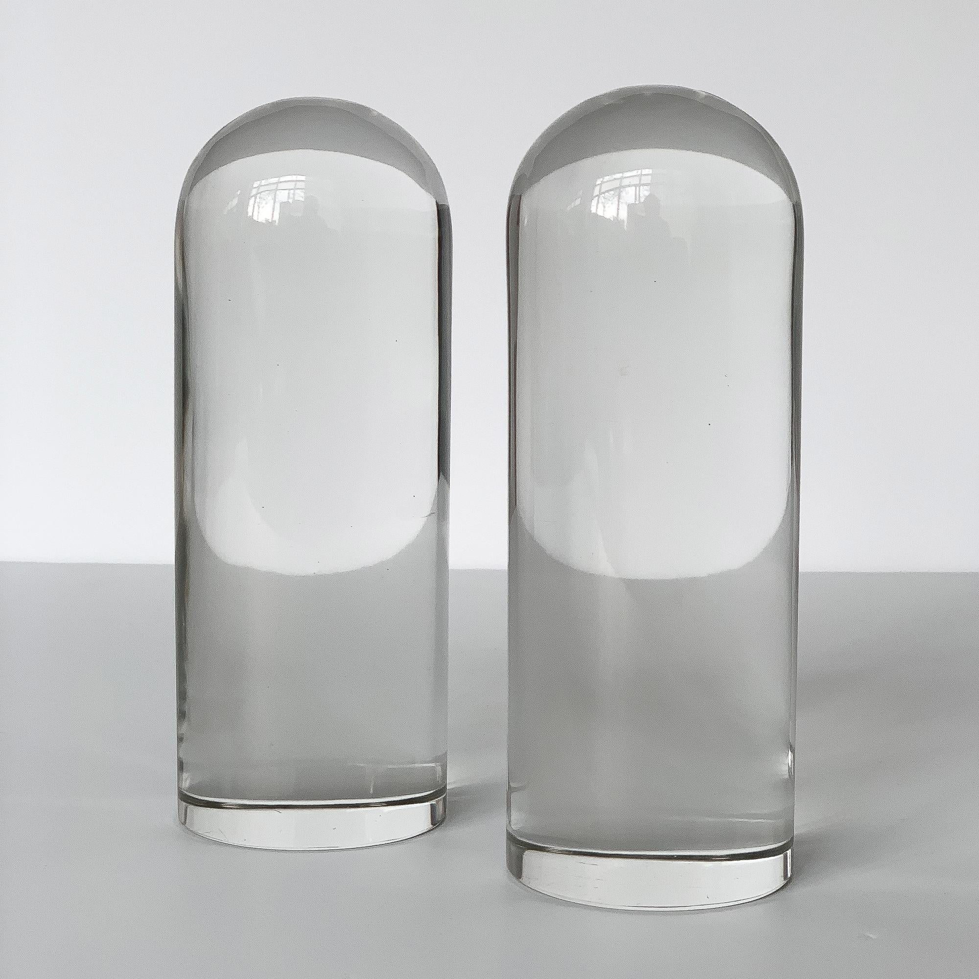 Pair of solid glass bullet shaped bookends or sculptural objects. 3