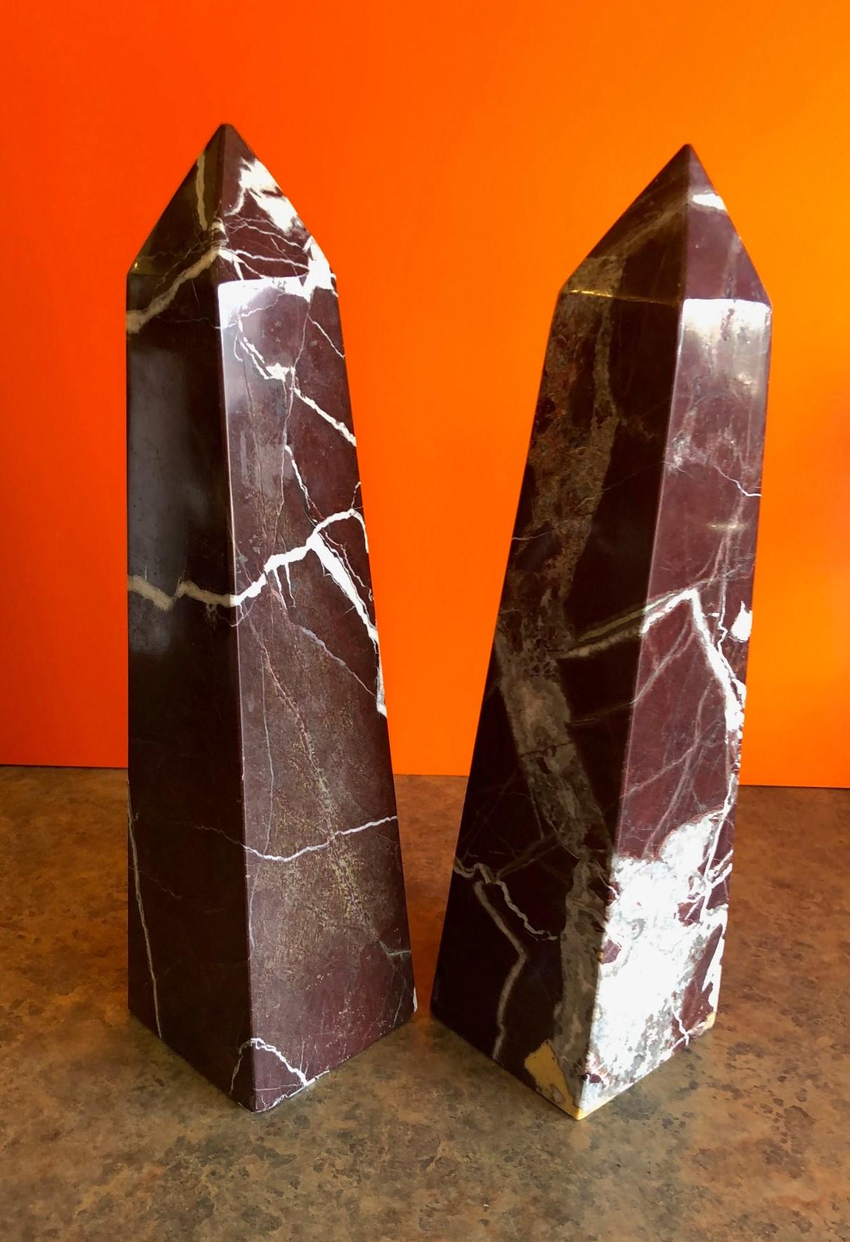 Beautiful pair of solid brown / white / grey marble decorative obelisks, circa 1970s. They are a massive 16.75