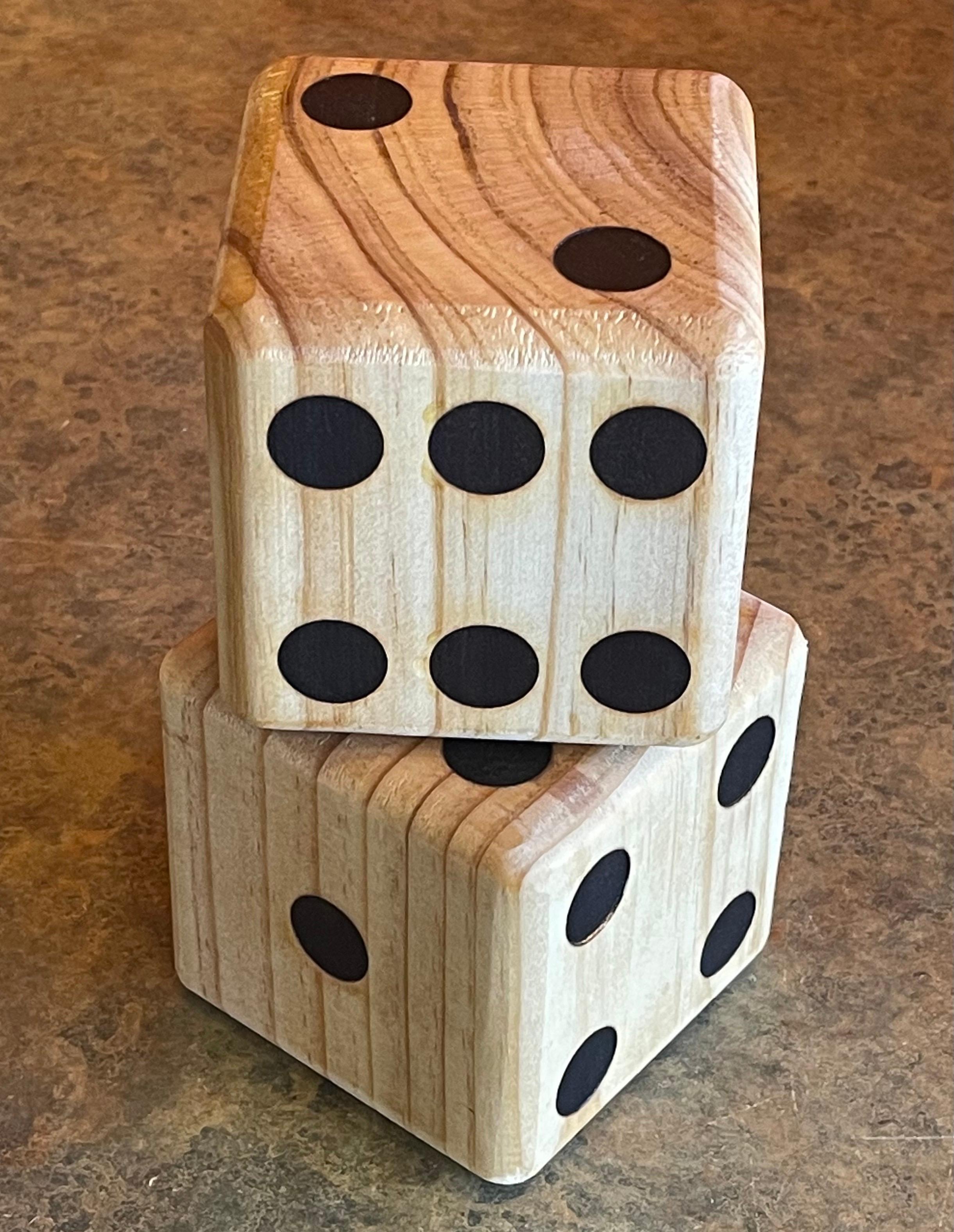Cool pair of solid oak Mid-Century Modern dice bookends or paperweights, circa 1980s. The dice are 3.5