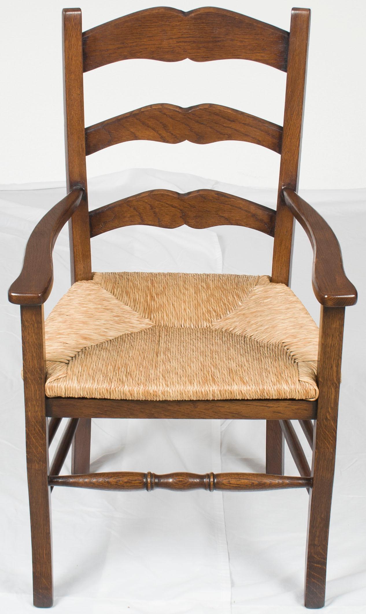 Rustic Pair of Solid Oak Rush Seat Ladder Back Dining Room Armchairs For Sale