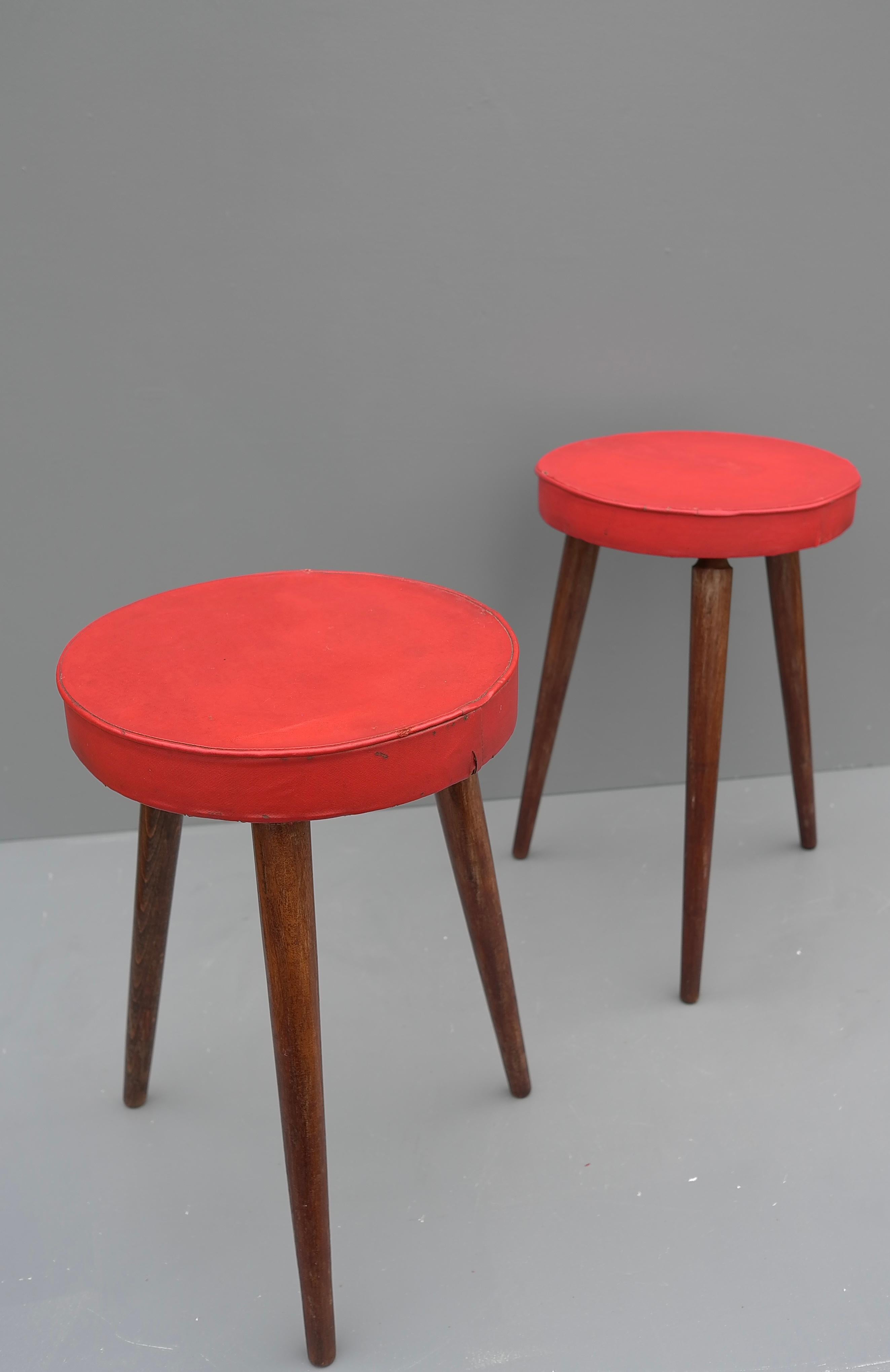 French Pair of Solid Oak Stools with Red Vinyl Seats, France, 1960's For Sale