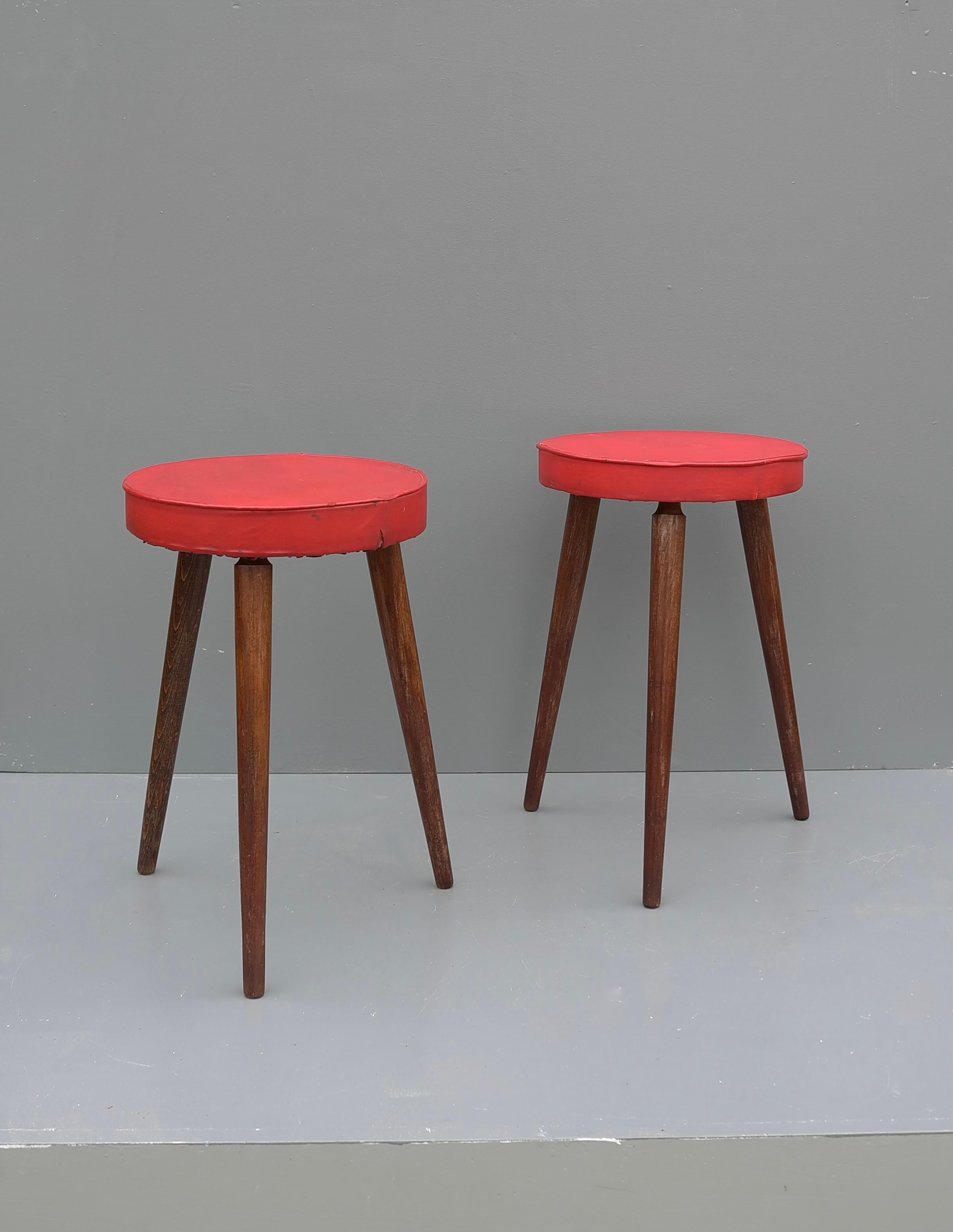 Mid-20th Century Pair of Solid Oak Stools with Red Vinyl Seats, France, 1960's For Sale