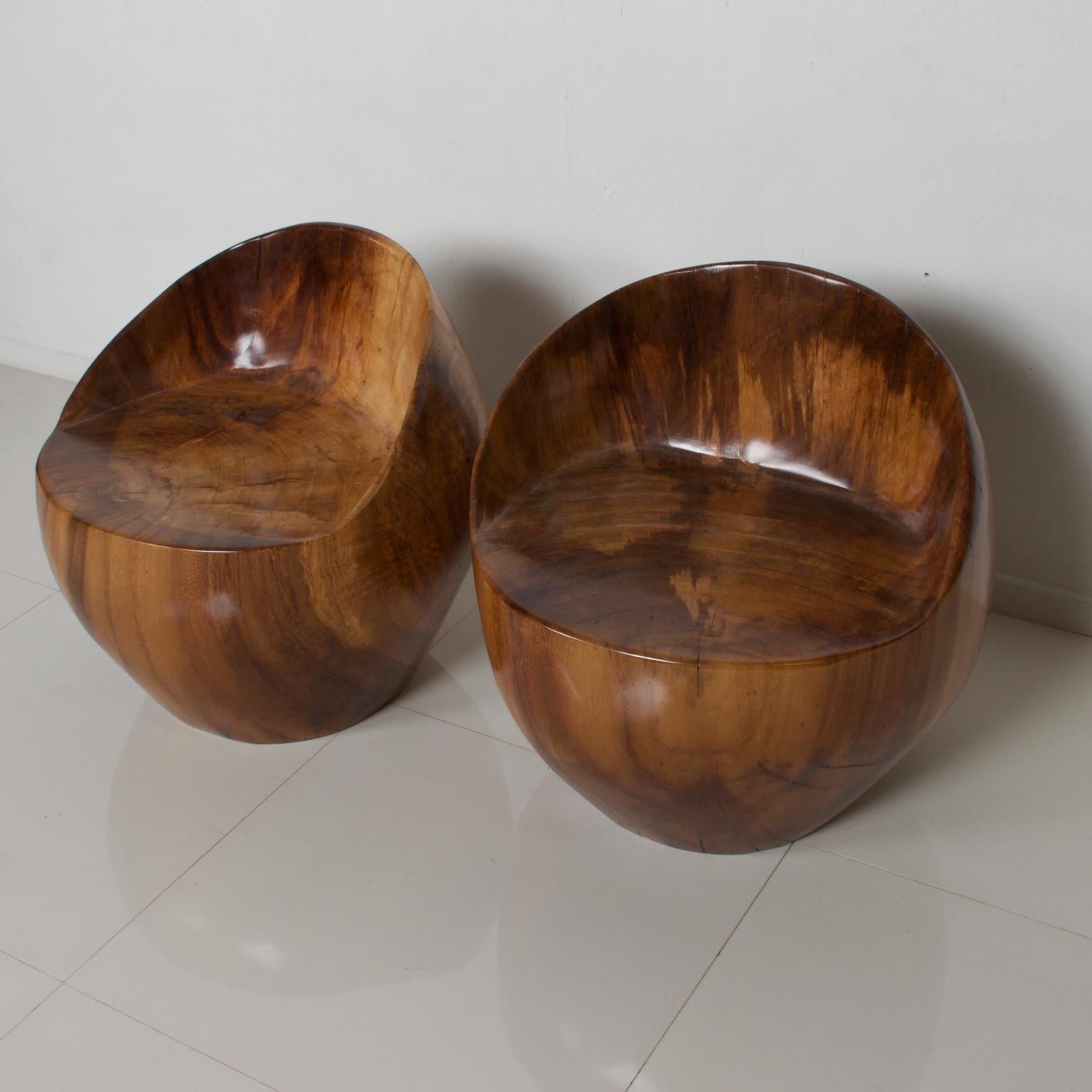 For your consideration: Pair of custom PAROTA chairs, tropical Latin American Exotic wood done in a modern Barrel tub design reminiscent of Don S Shoemaker. Set of two chairs.
Parota is a highly prized sustainable wood with a bold striking wood