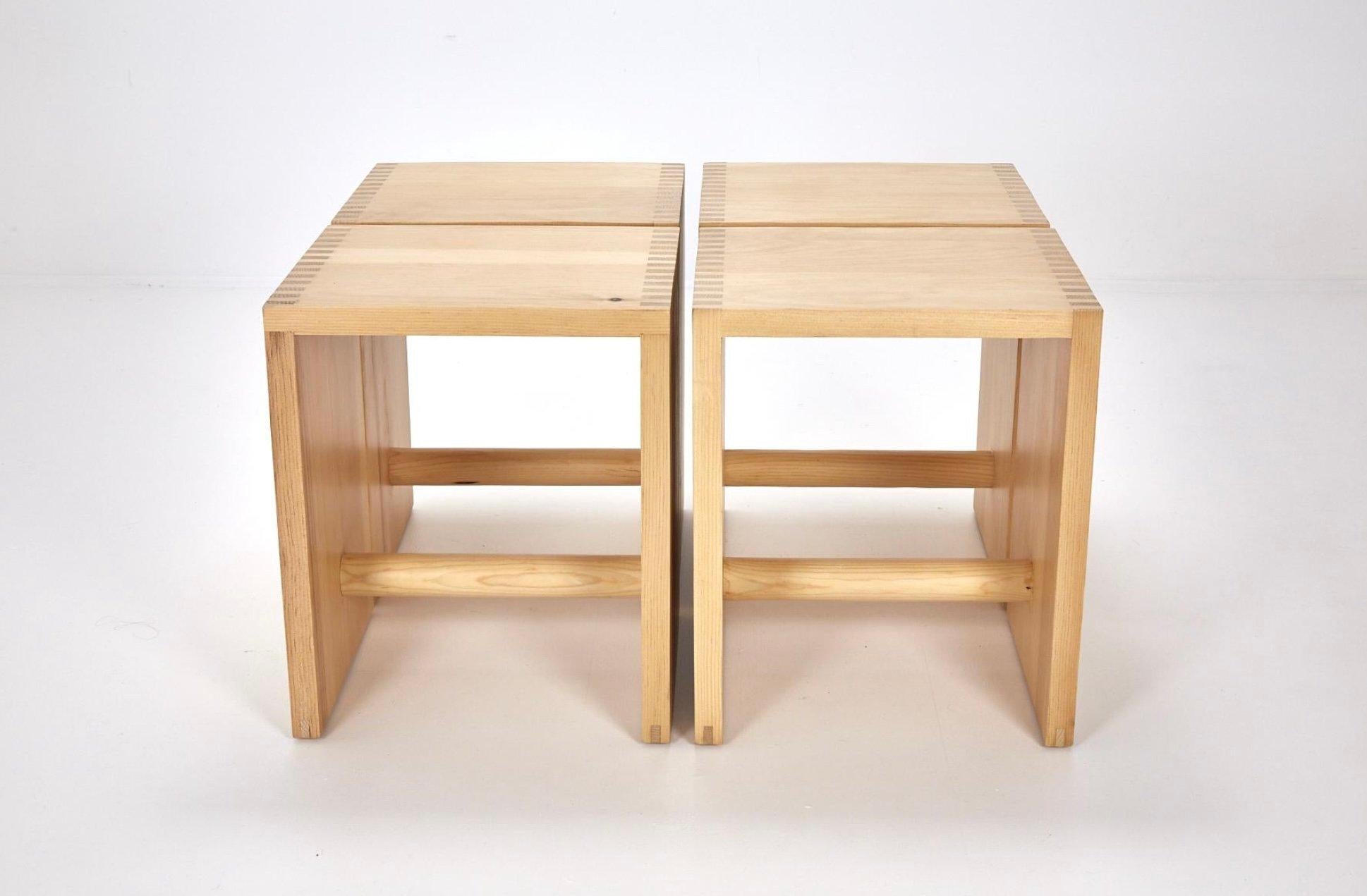Mid-Century Modern Pair of solid pine stools / side tables with cylindrical foot rail c. 1970's For Sale