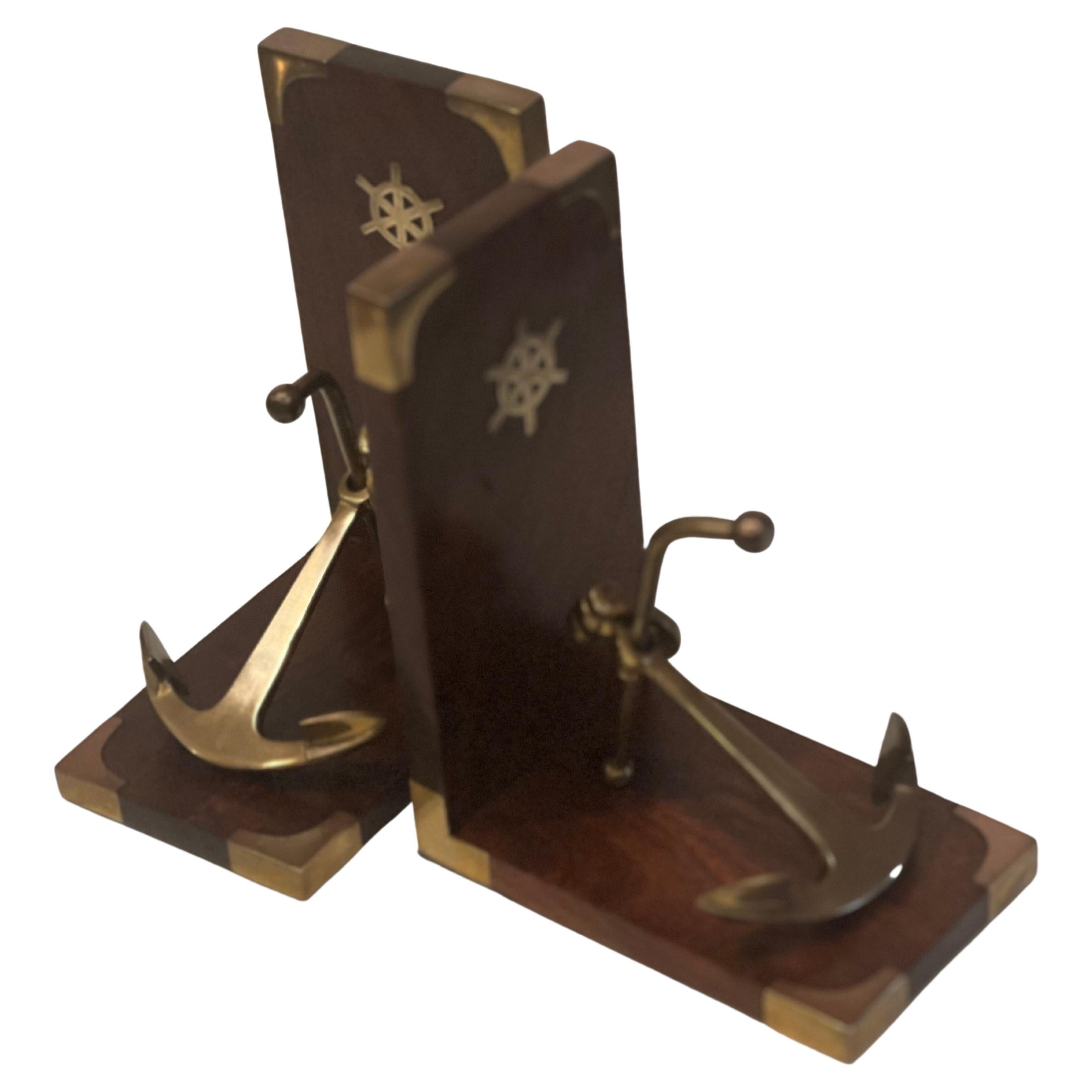 A pair of solid rosewood and patinated solid brass bookends circa 1970's beautiful and elegant in the style of Ralph Lauren, made in Italy in nice condition.