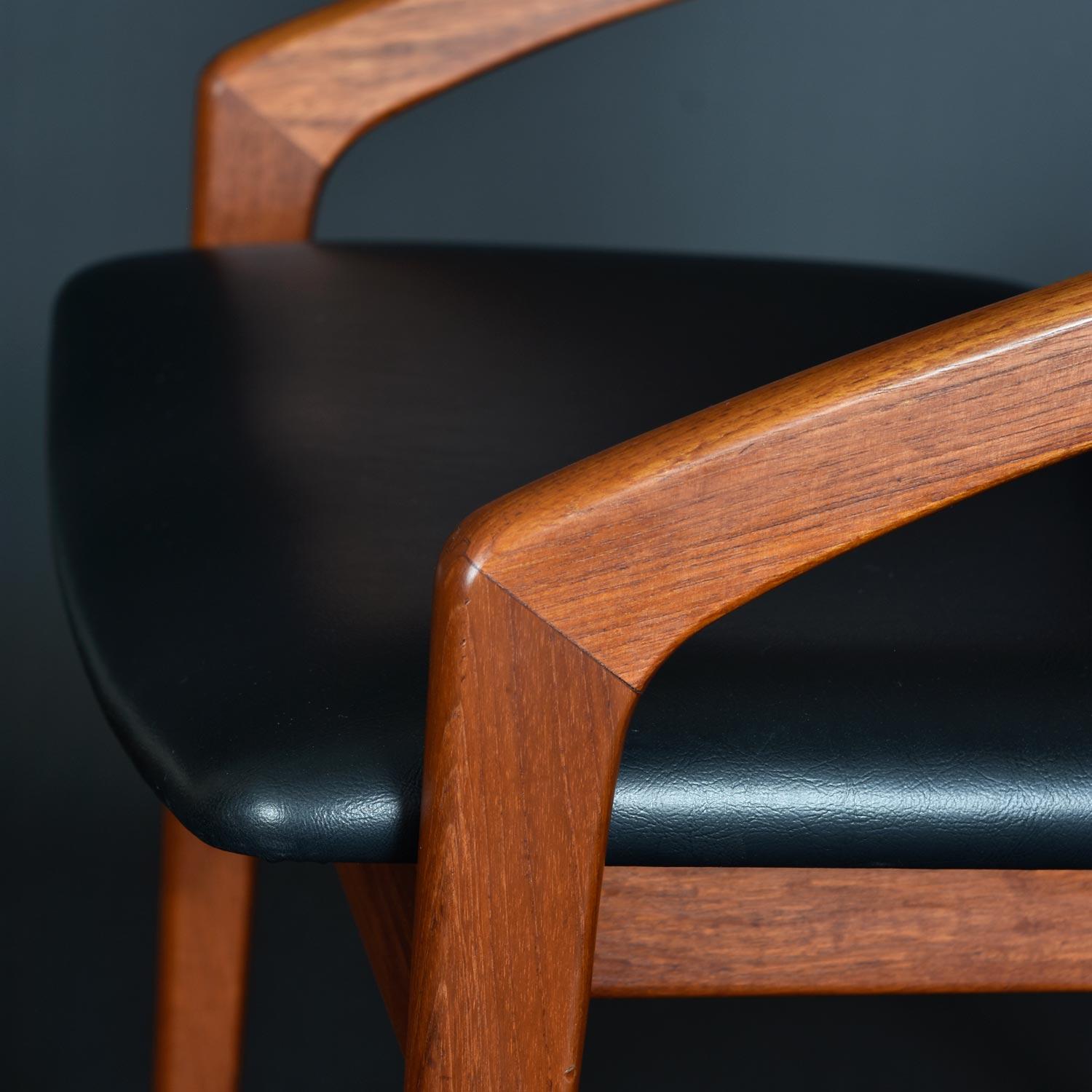 Faux Leather Pair of Solid Teak Danish Kai Kristiansen Armchairs with Newer Black Vinyl