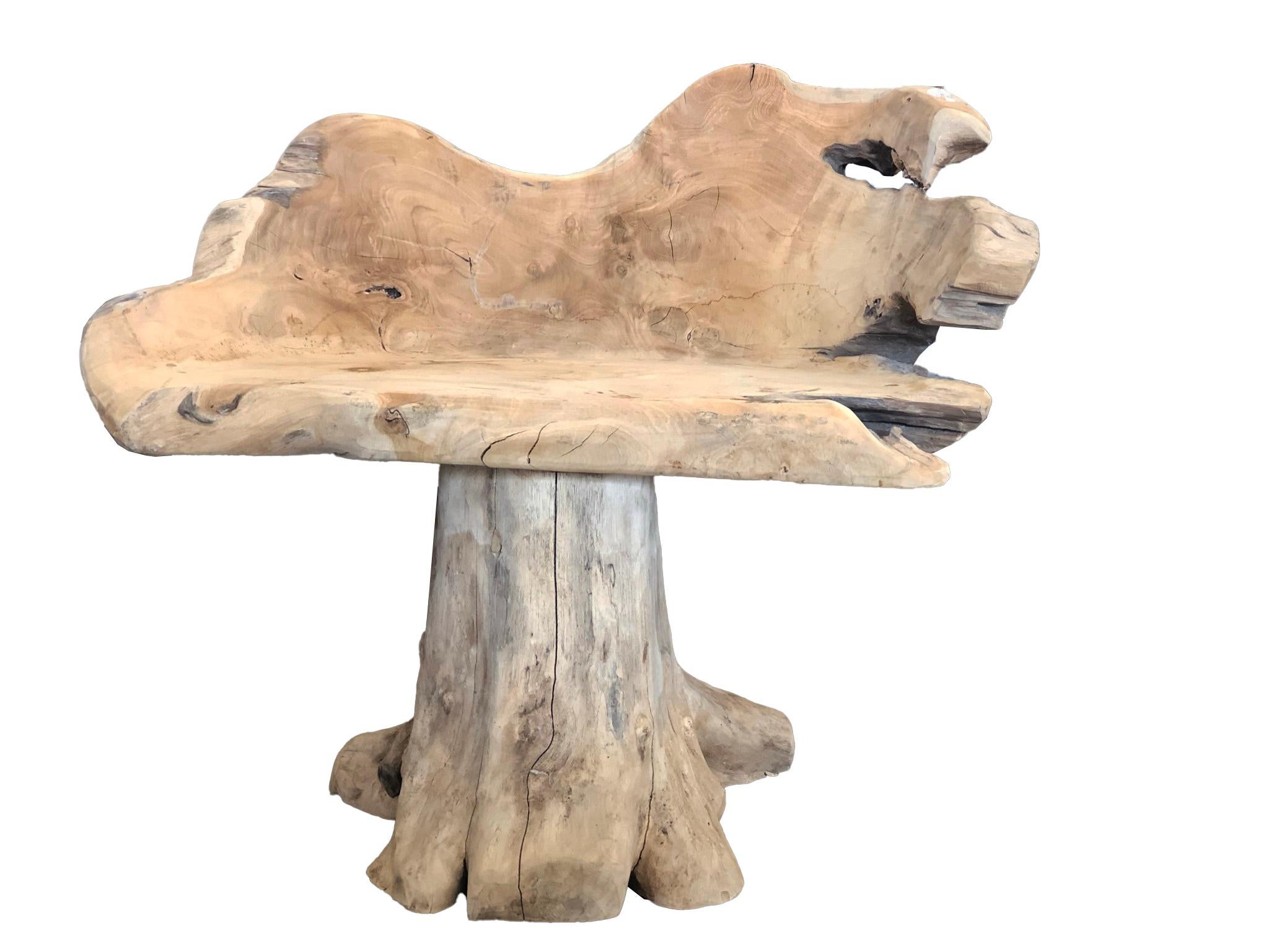 Pair of Organic natural teak root seat. Handmade in Indonesia from one single reclaimed teak root in its natural state. Natural markings like knots, lines, splits, holes and distinct grain patterns. Very sturdy and complimentary many design styles.