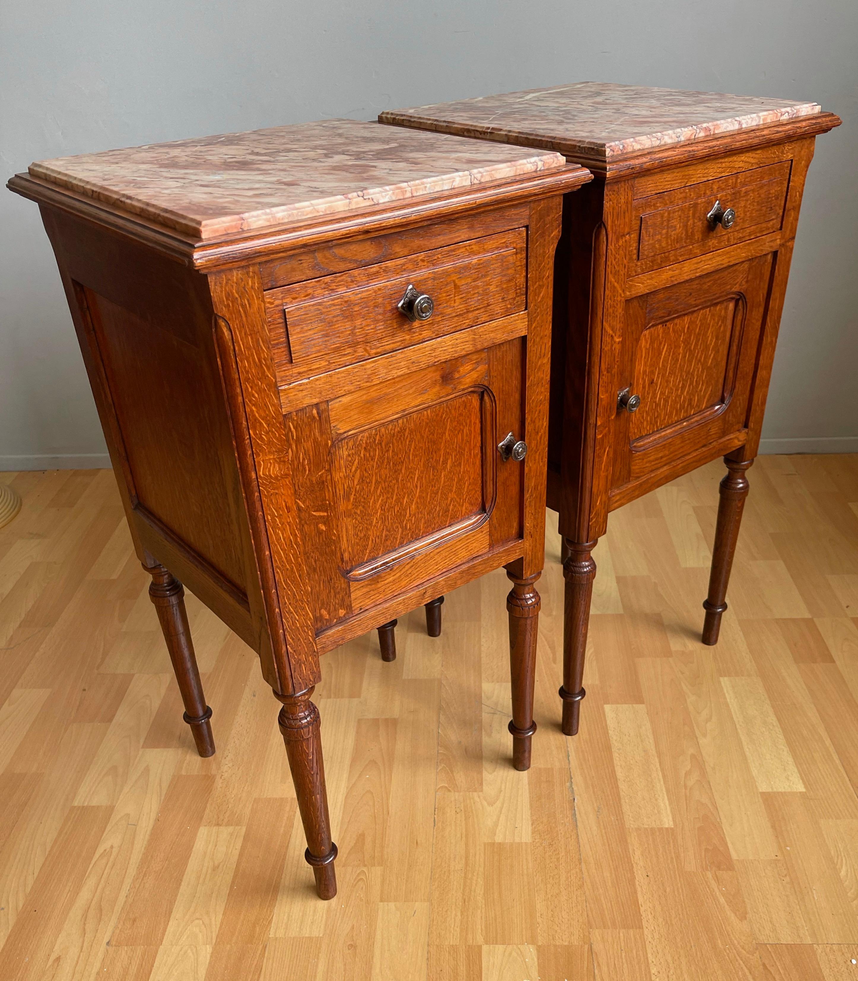 Beautiful and practical pair of Arts and Crafts nightstands with colorful marble tops.

If you are looking for timeless and beautifully handcrafted bedside cabinets then this Arts & Crafts pair could be yours to own and enjoy soon. They are made of