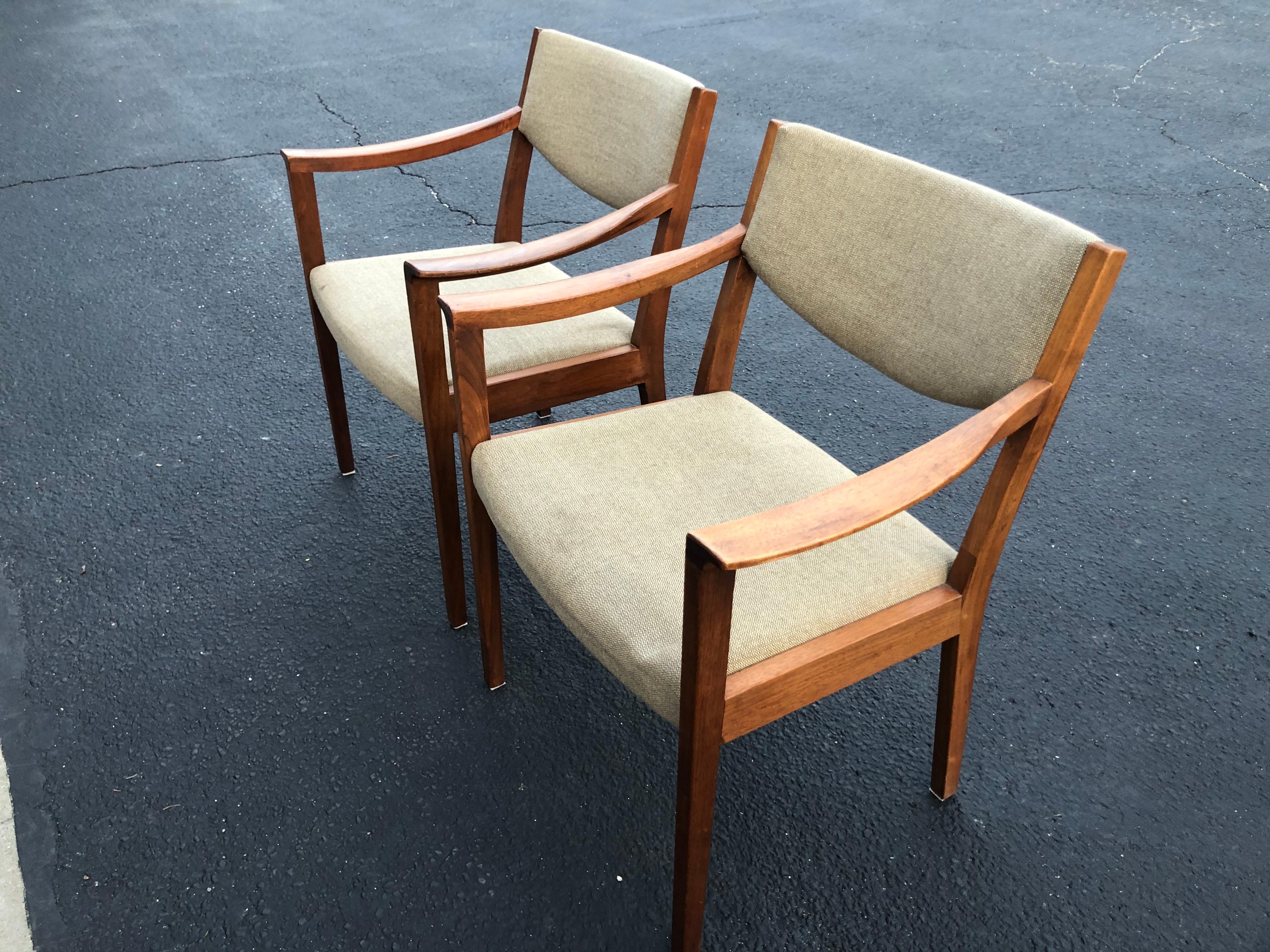 Pair of solid walnut Gunlocke armchairs. Iconic design for that 1960s office. -Price is for the pair (2)

These came out of the Headquarters of Boehringer Ingelheim which was founded in the early 1970s. They have the original purchase labels on the
